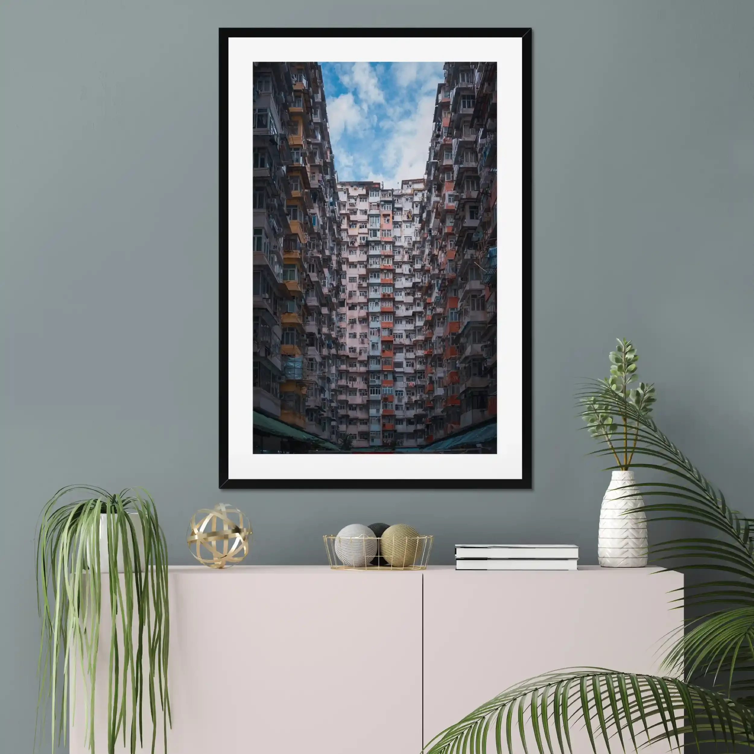 Symmetrical wide-angle photography of the massive Monster Building residential complex in Quarry Bay, Hong Kong.