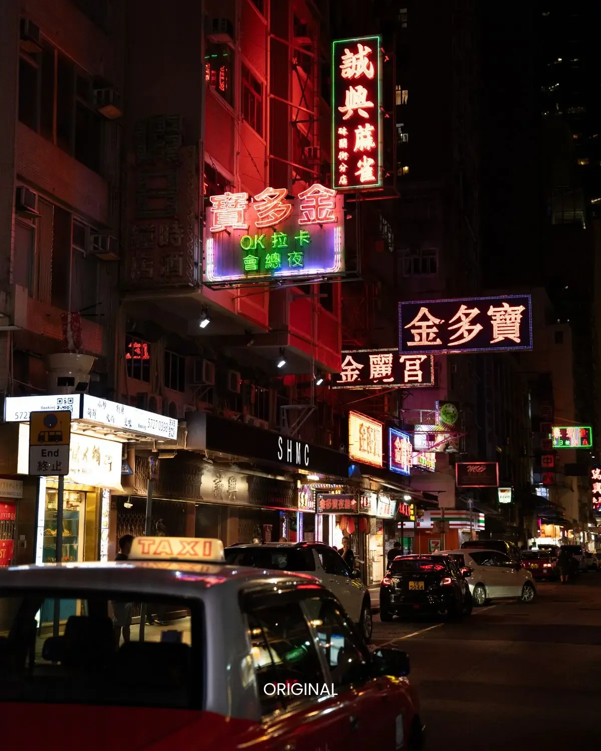 Before/After: Lomography X-Pro preset. Adds bold, high-contrast cross-processed vintage colors to a dark street scene.