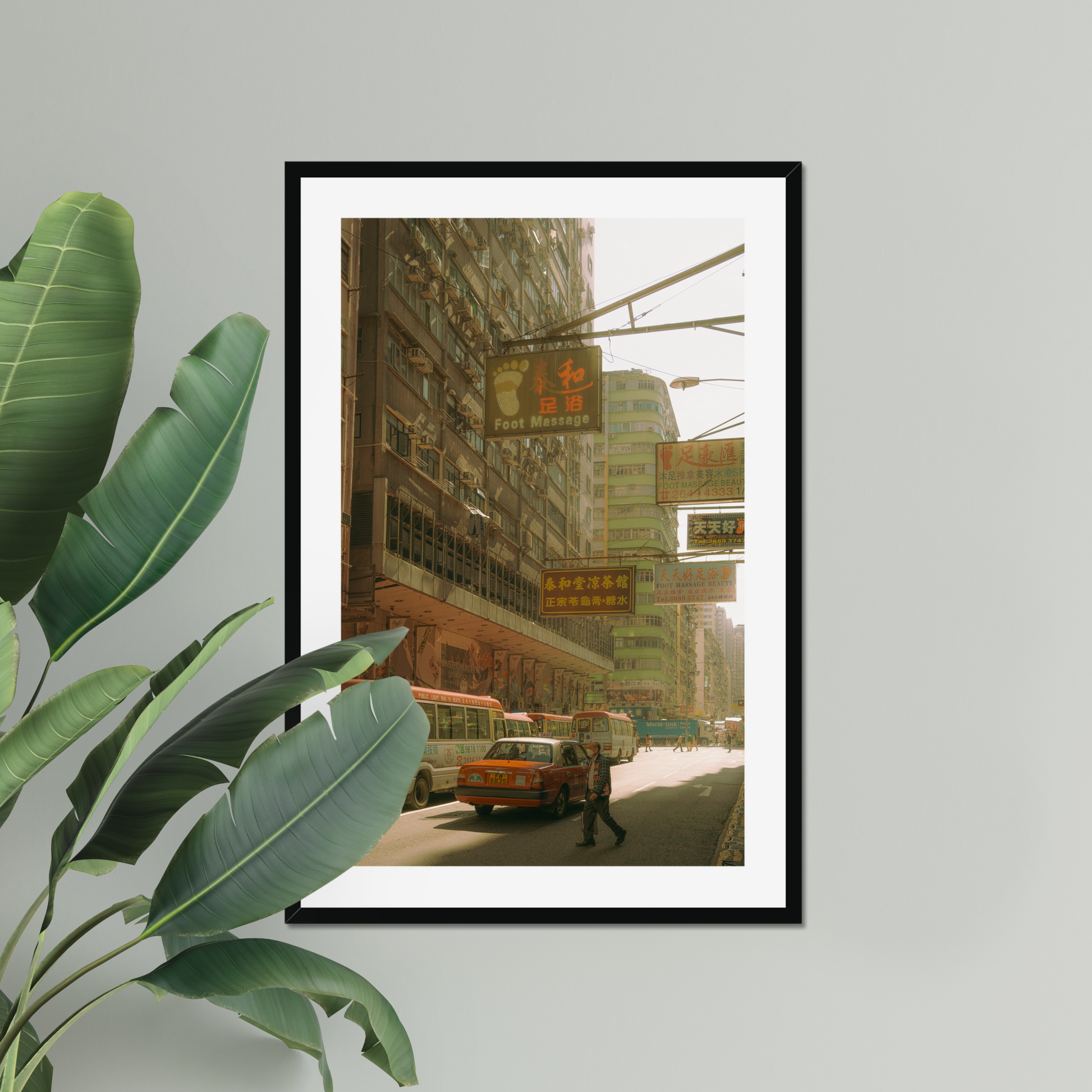 Sun-drenched Hong Kong street photography fine art print. Cinematic urban scene with vintage signs, a red taxi, and a solitary pedestrian crossing. Warm wall art decor.