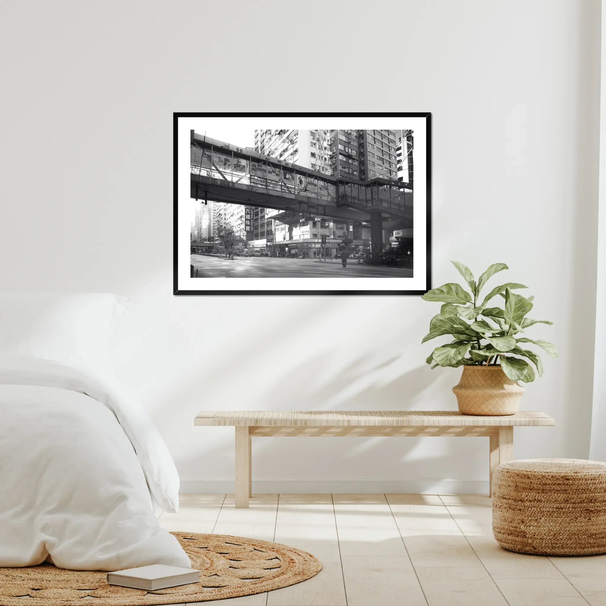 Black and white street photography print of a solitary figure walking through a narrow Hong Kong alley in a dramatic shaft of light. High-contrast cinematic Noir fine art wall decor.