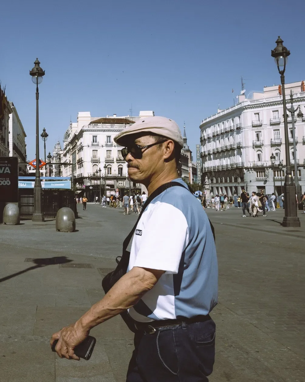 Before and after comparison of Kodak Pro 100 Lightroom preset showing soft contrast and warm film tones on a daylight portrait.