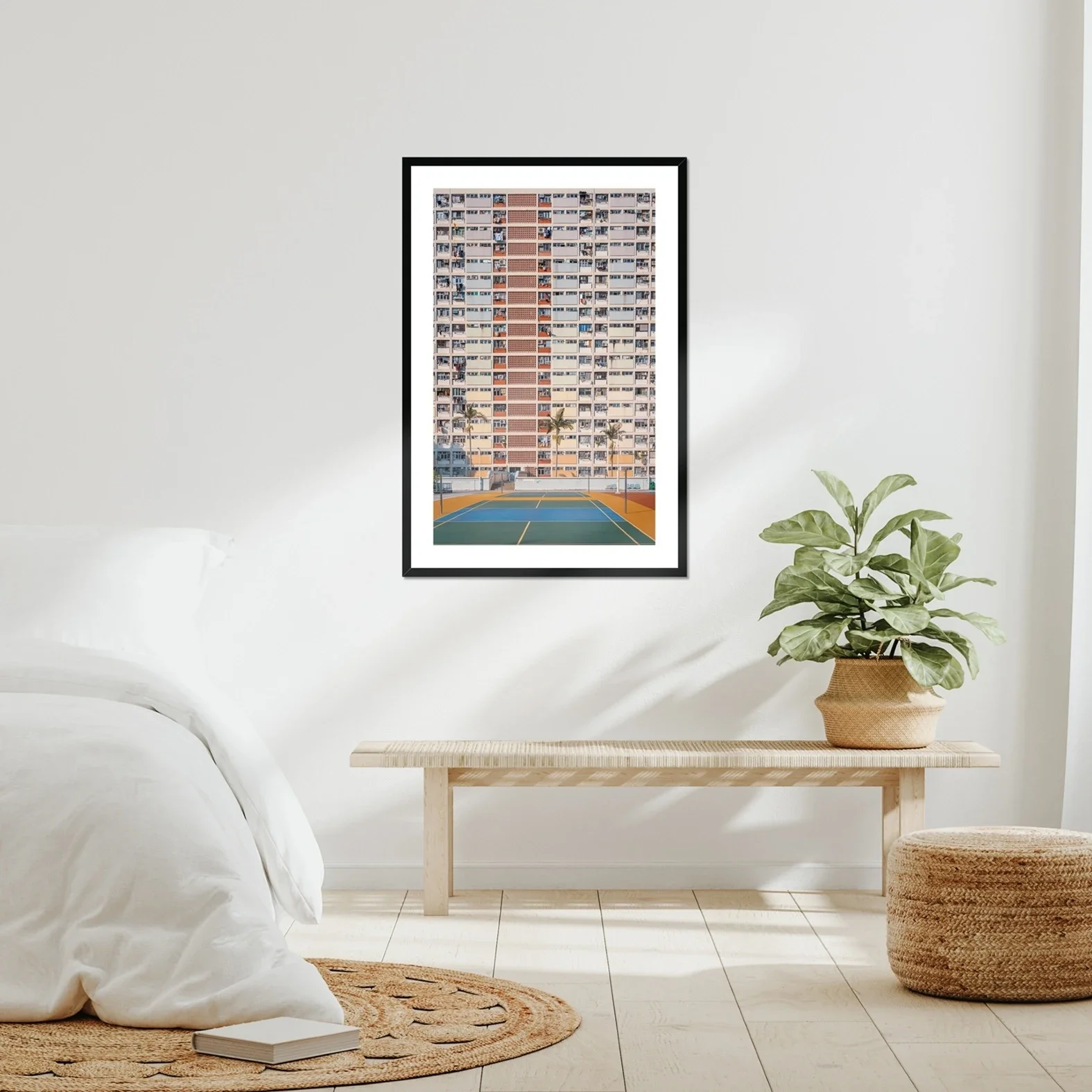 Professional architectural photography of the rainbow-colored Choi Hung Estate in Hong Kong, featuring the pastel building facade and basketball courts in the foreground.
