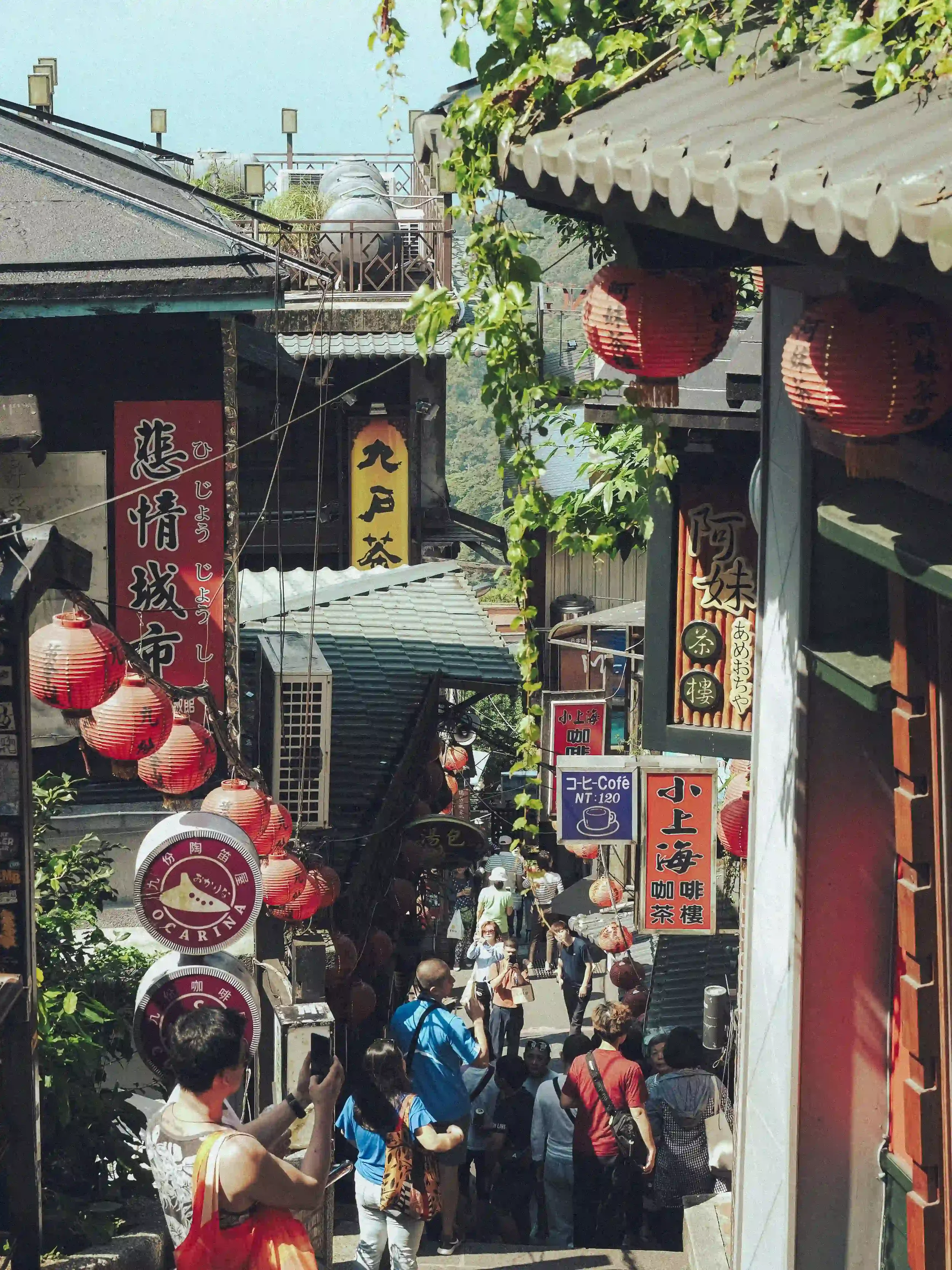 Before and after comparison of a sunlit portrait and street scene edited with the Kodak Portra 400 Lightroom preset, showing warm skin tones and 35mm film emulation by ejduranphotography