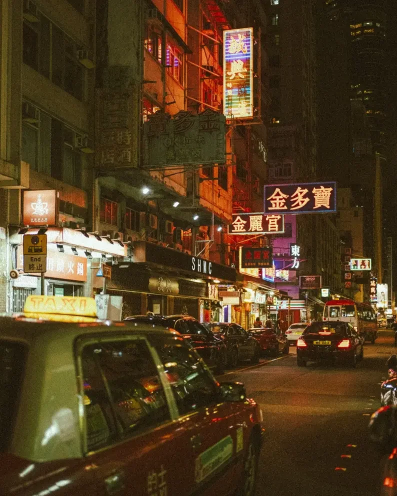 efore and after Lomography X-Pro preset on a red classic car in Madrid, showing vintage cross-processed film colors and high contrast.