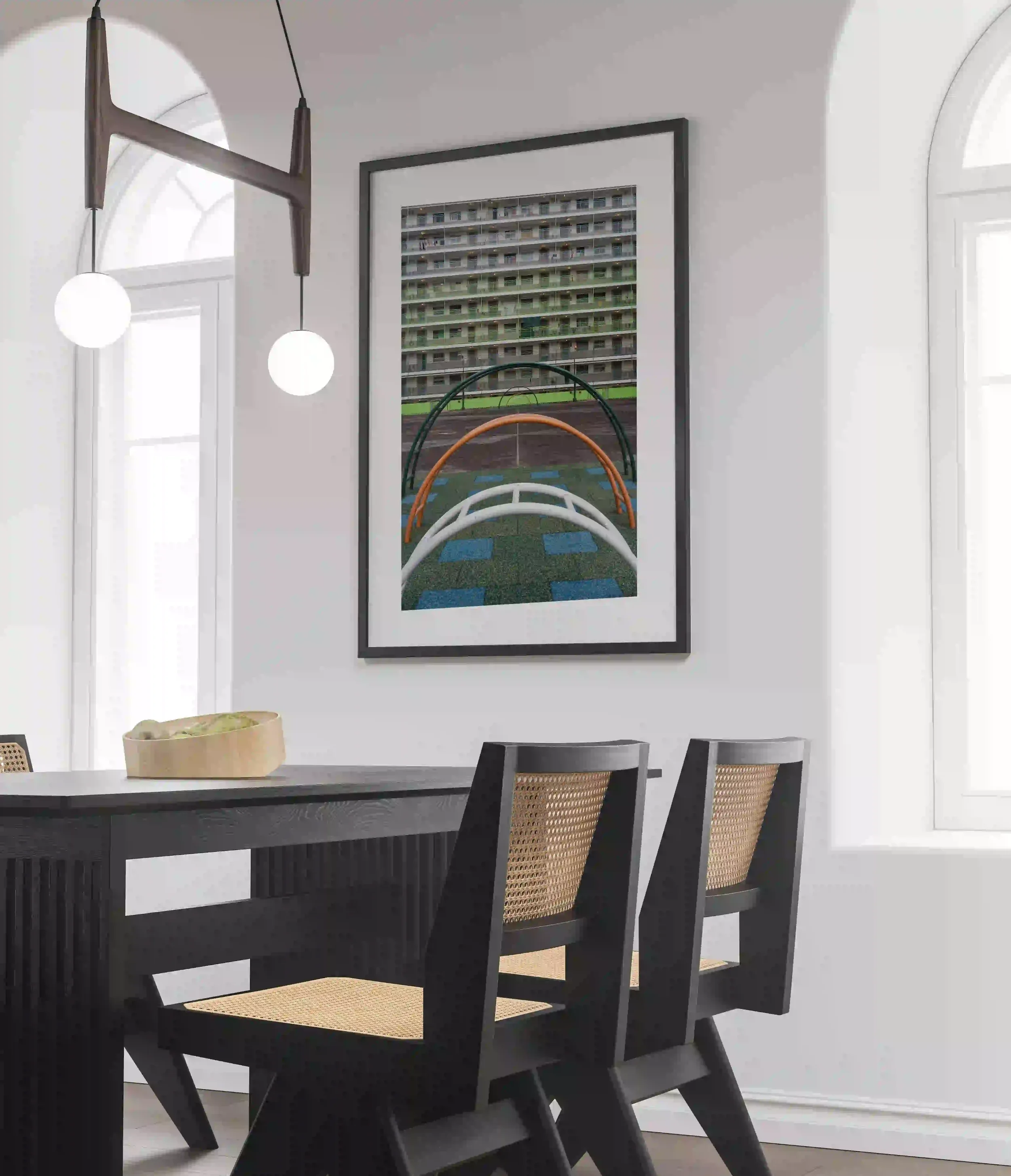 Symmetrical photography of the green residential buildings and the colorful courtyard playground at Nam Shan Estate in Hong Kong.