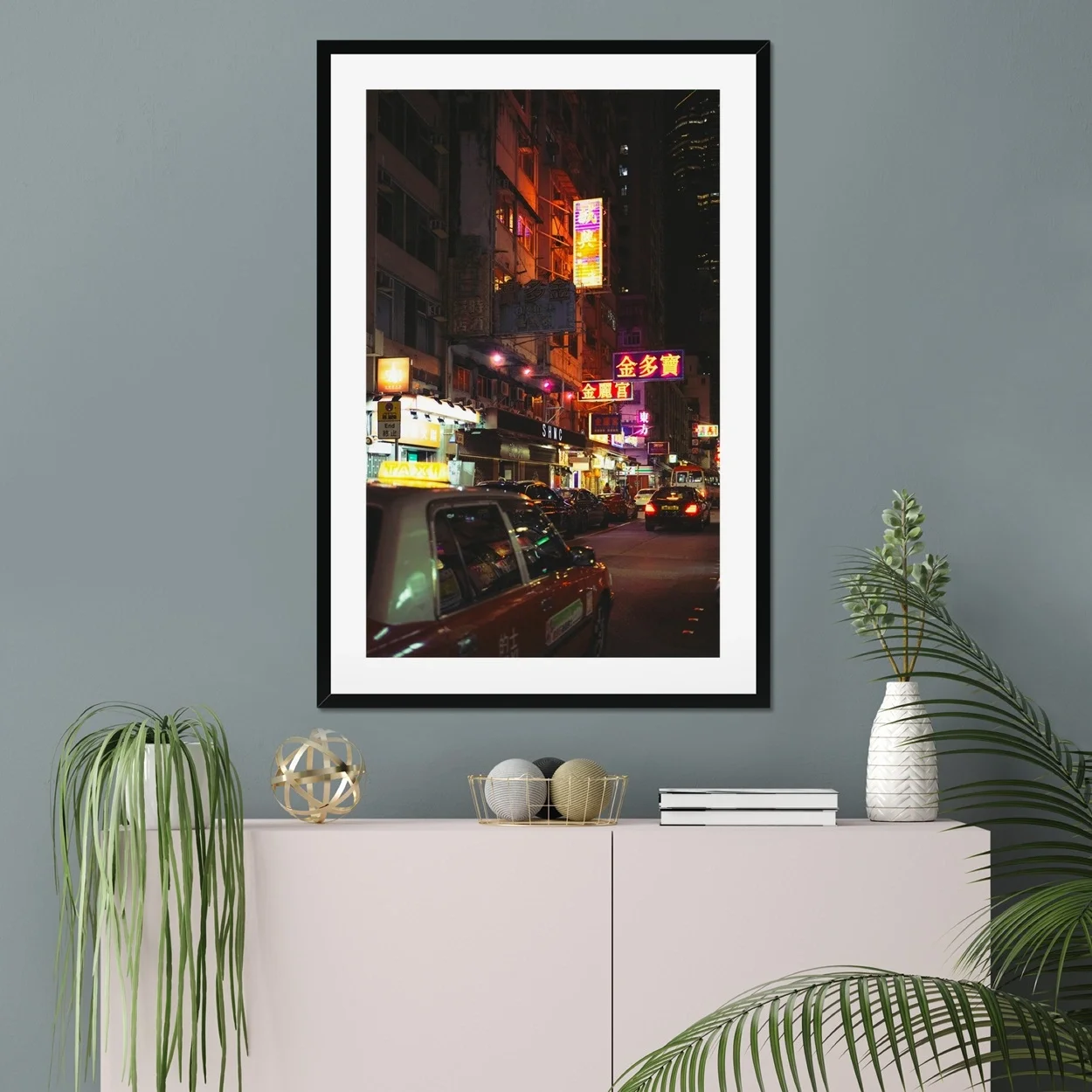 Cinematic night photography of a red taxi in Mong Kok Hong Kong, neon signs reflections on wet street, CineStill 50D film aesthetic, urban street documentary art.