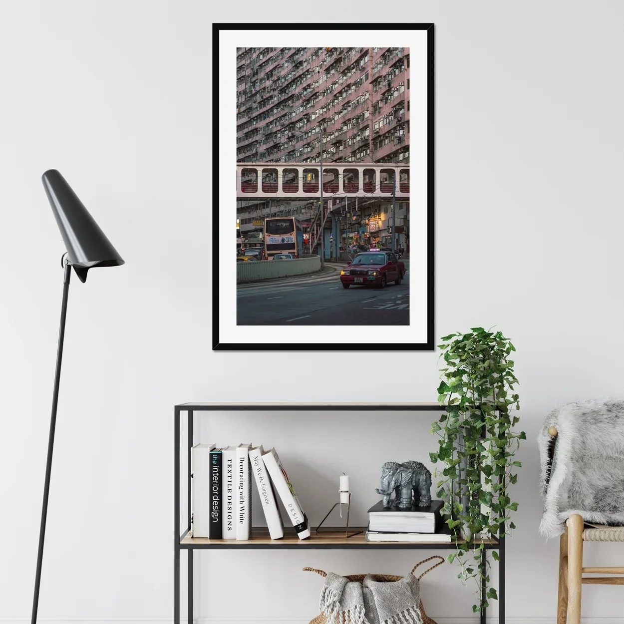 Street photography of a red taxi driving through Quarry Bay, Hong Kong, with historic residential buildings in the background at sunset.