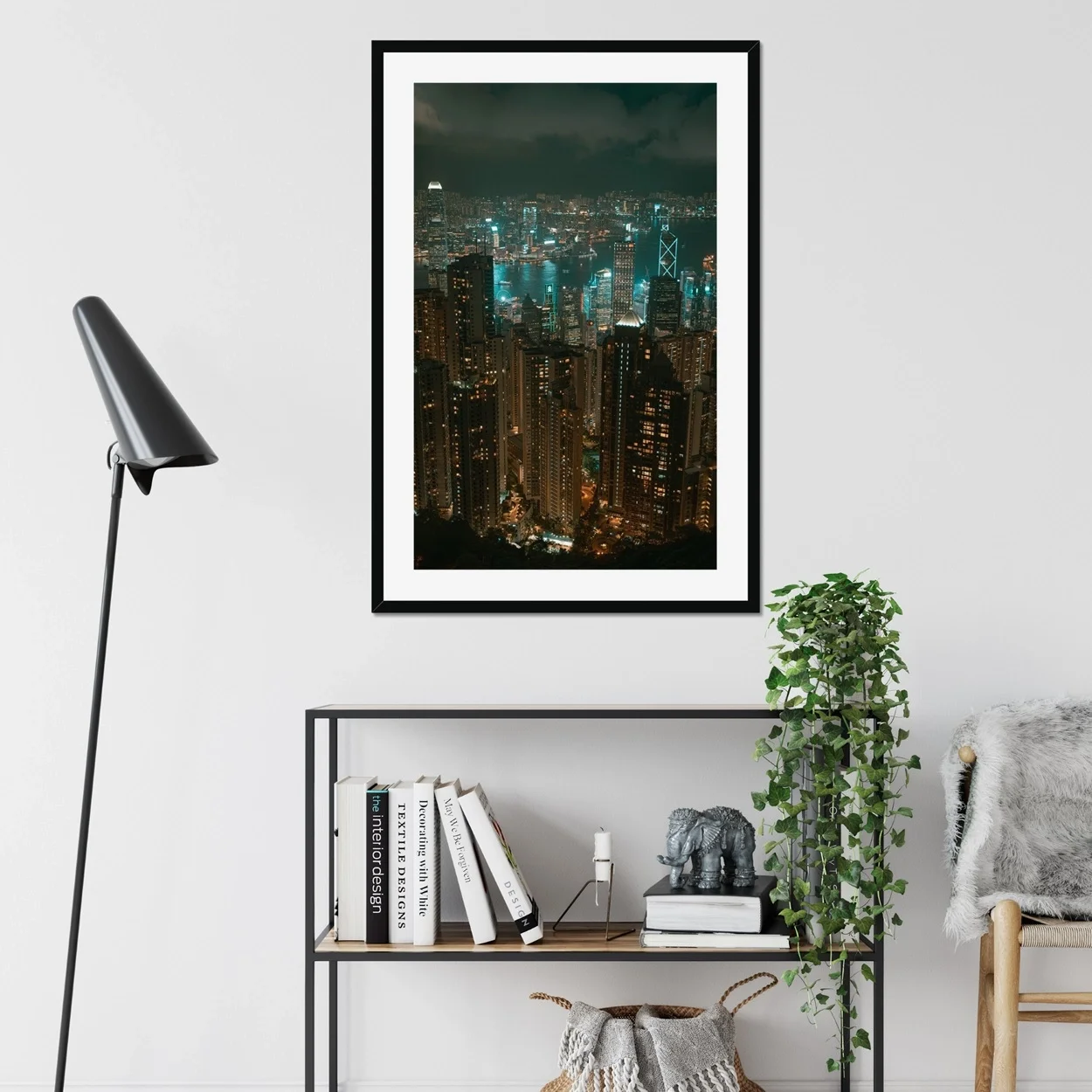 Panoramic night photography of Hong Kong skyline from Victoria Peak with glowing skyscrapers and futuristic blue tones.