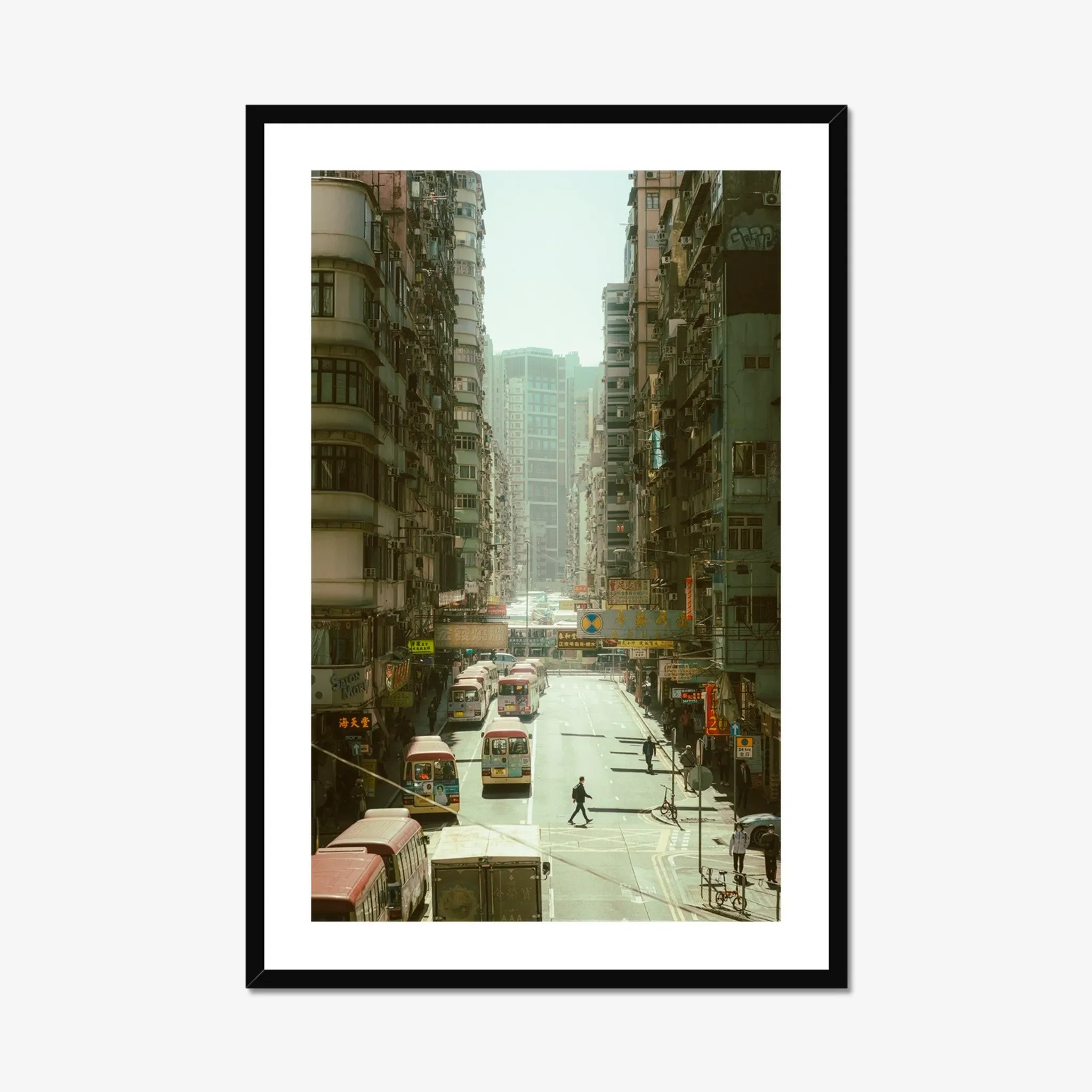 Dynamic street photography in Mong Kok Hong Kong, bustling Kowloon traffic and pedestrians, urban city life print, bright Hong Kong cityscape wall art, architectural density photography.