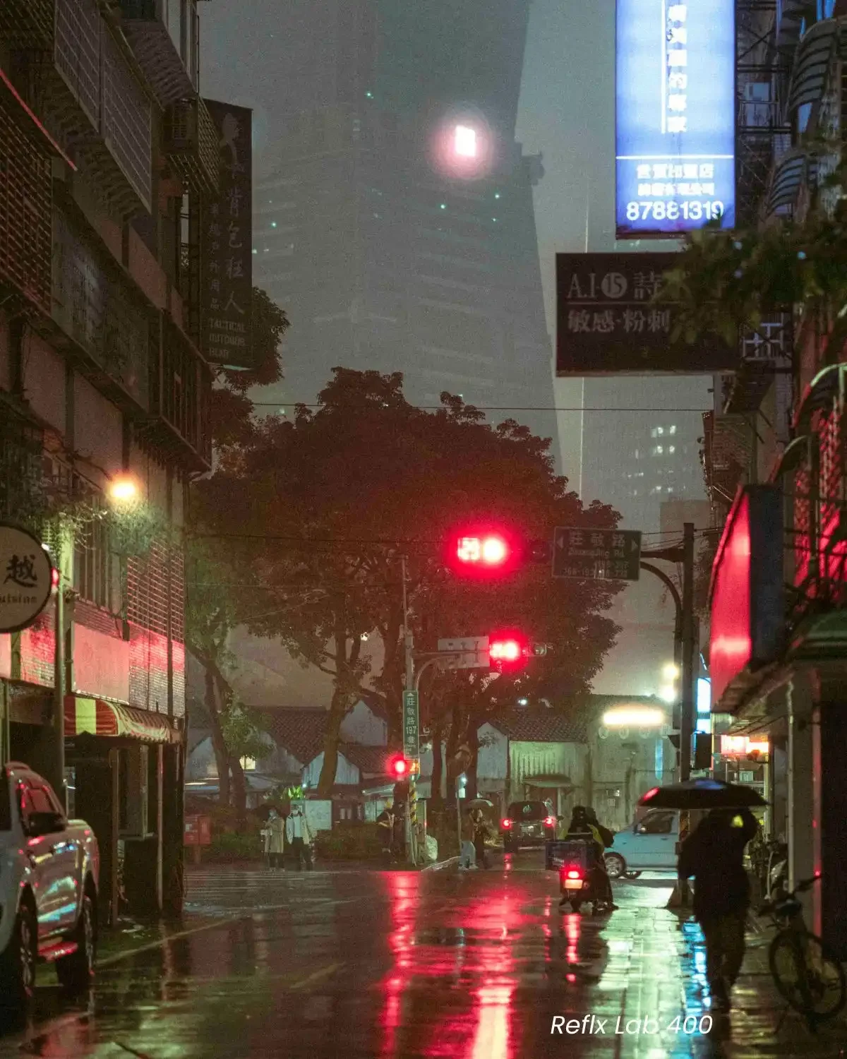 Comparison of Reflx Lab 800T and FilmNeverDies Suibo 500T film look presets on night street photography.