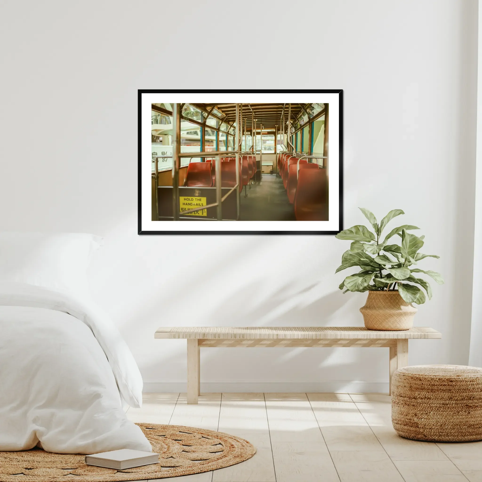 Vintage Hong Kong tram interior fine art print featuring red seats and a hold the handrails sign in warm cinematic tones.
