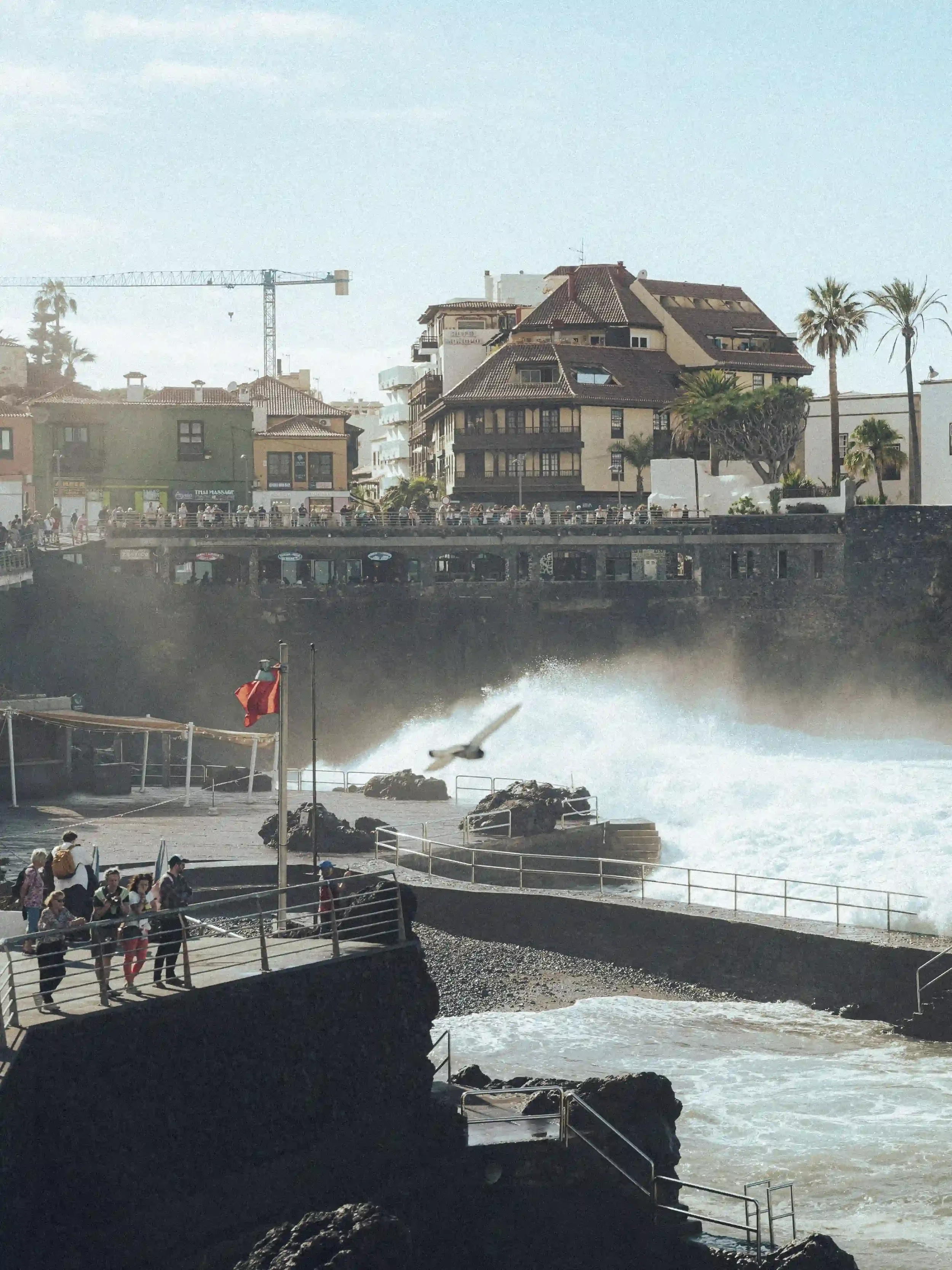Before and after comparison of a sunlit portrait and street scene edited with the Kodak Portra 400 Lightroom preset, showing warm skin tones and 35mm film emulation by ejduranphotography