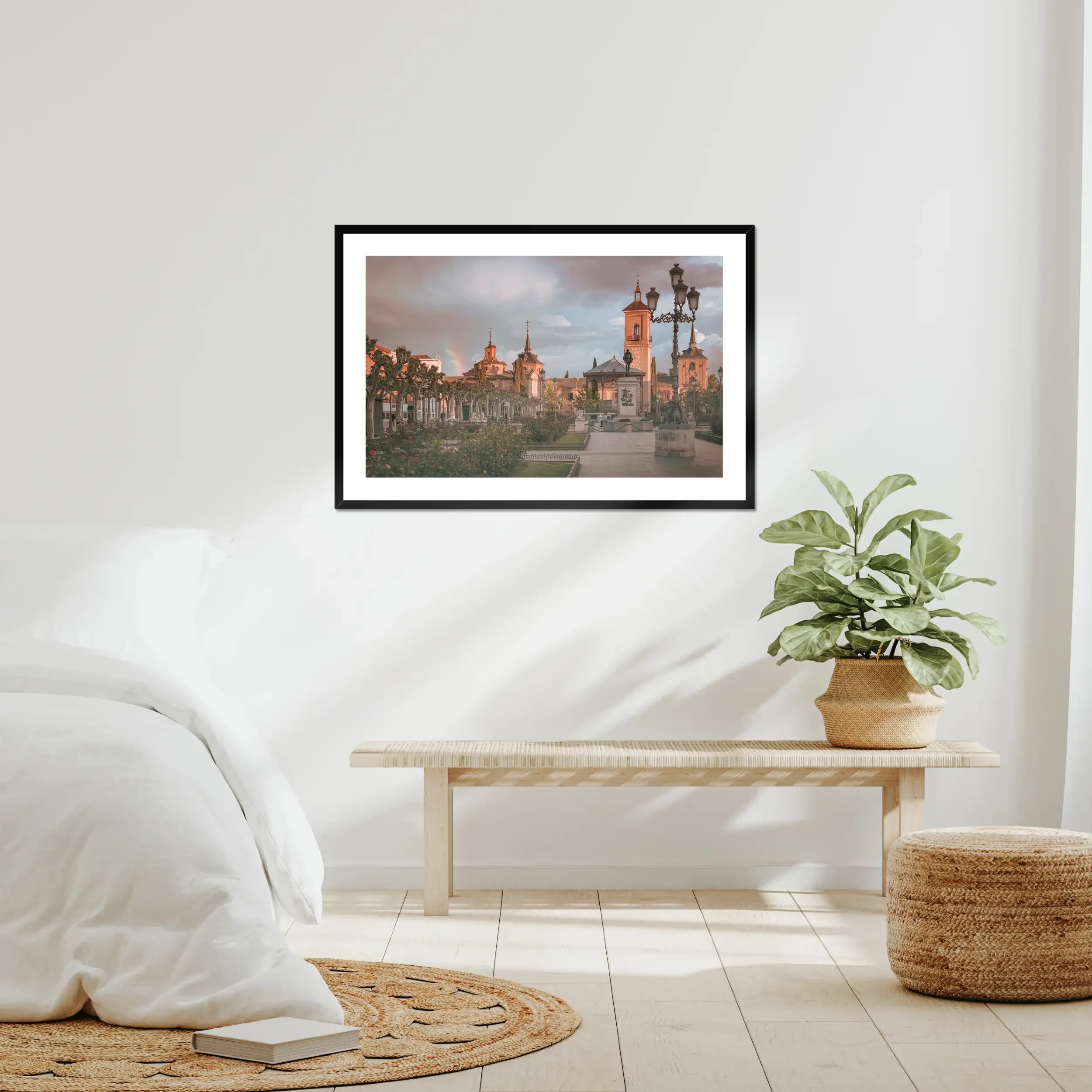 Fine art photography of Plaza de Cervantes in Alcala de Henares, Madrid, featuring a rainbow and dramatic stormy sunset over the historic square.