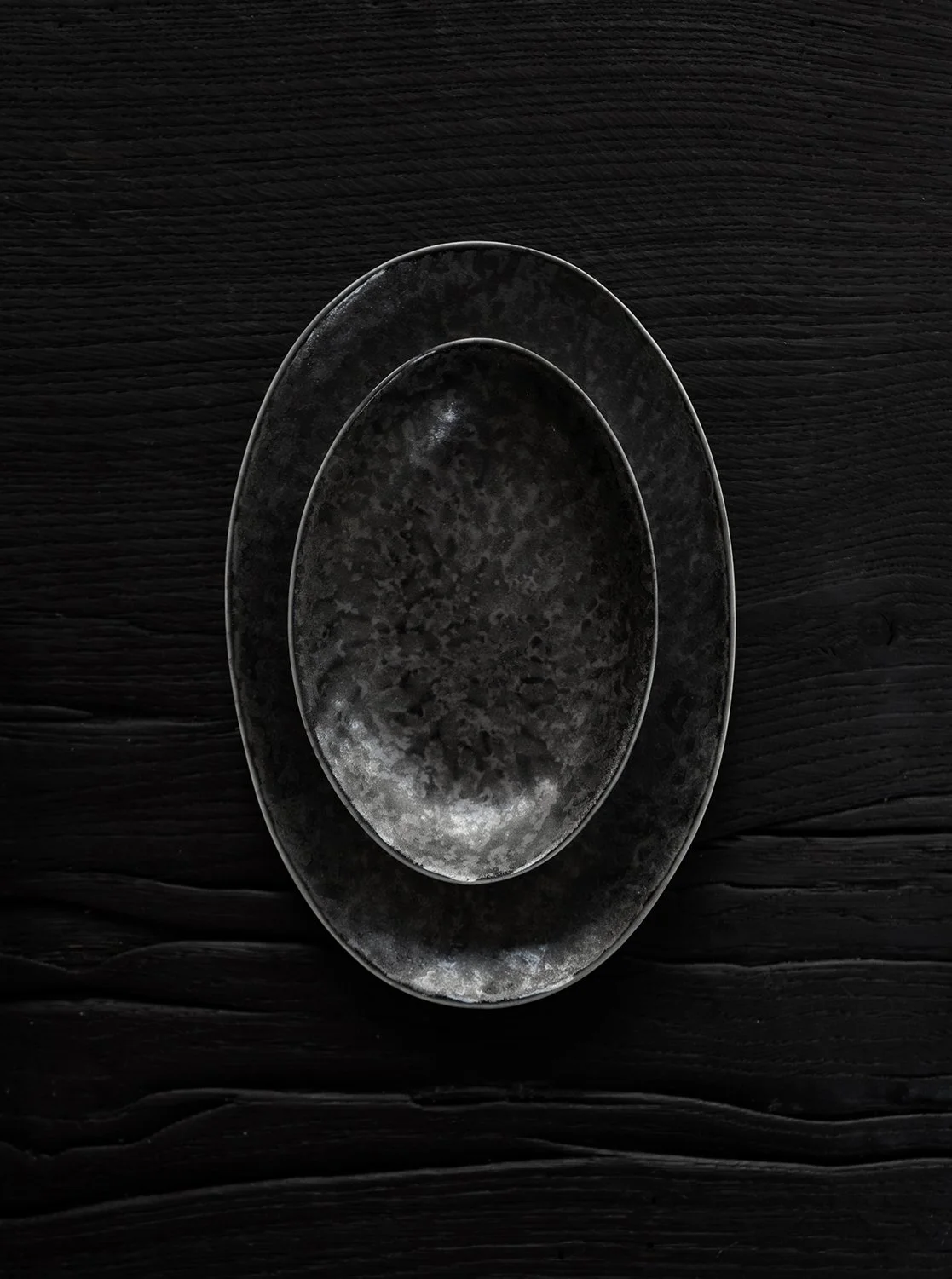 Black Ovum plates, Sarah-Linda, sensual tableware, branding, web design and editorial project by Automne Studio.