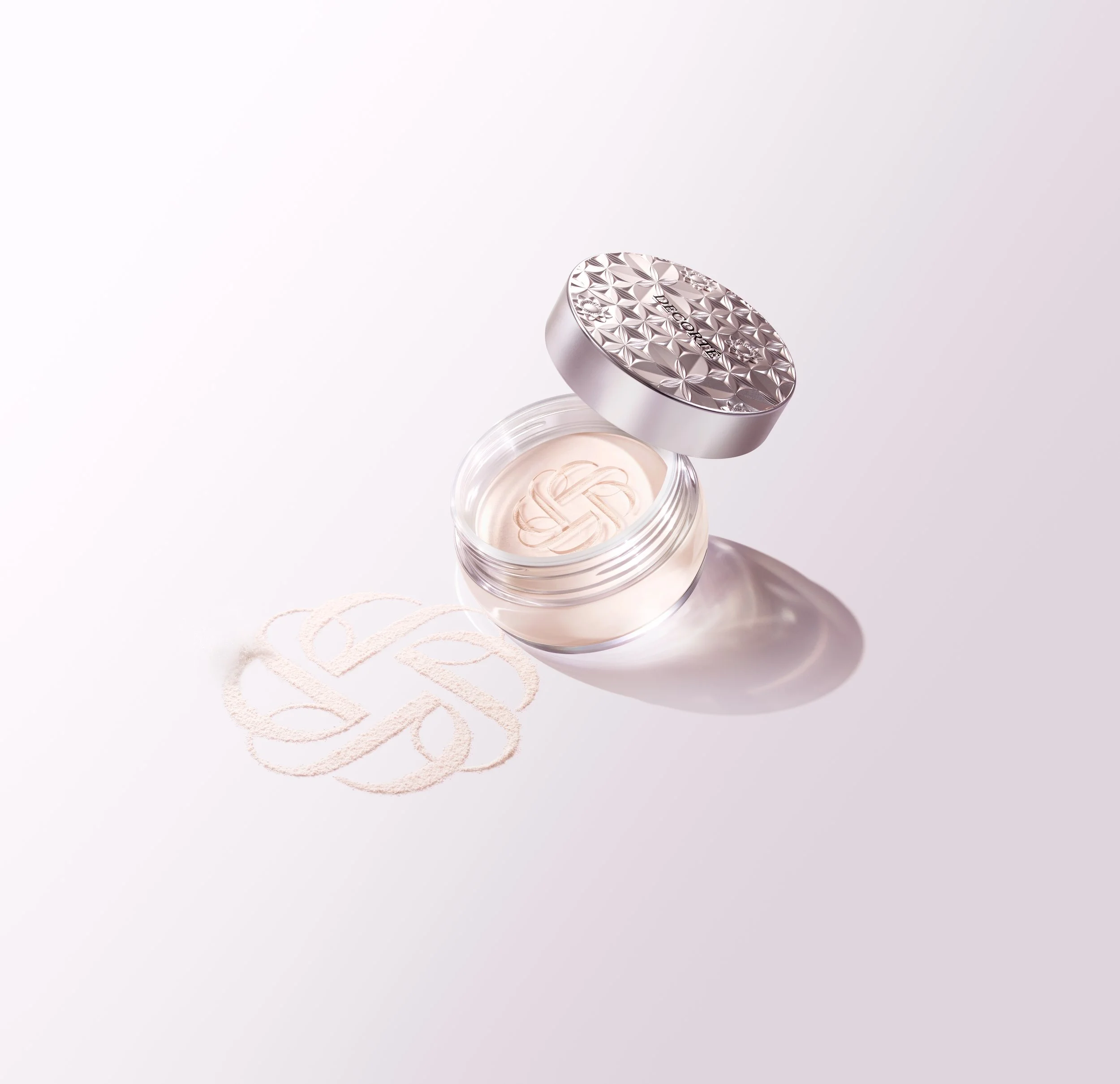 Open luxury skincare cream jar, Marcel Wanders x Decorté Emblem, branding by Automne Studio.