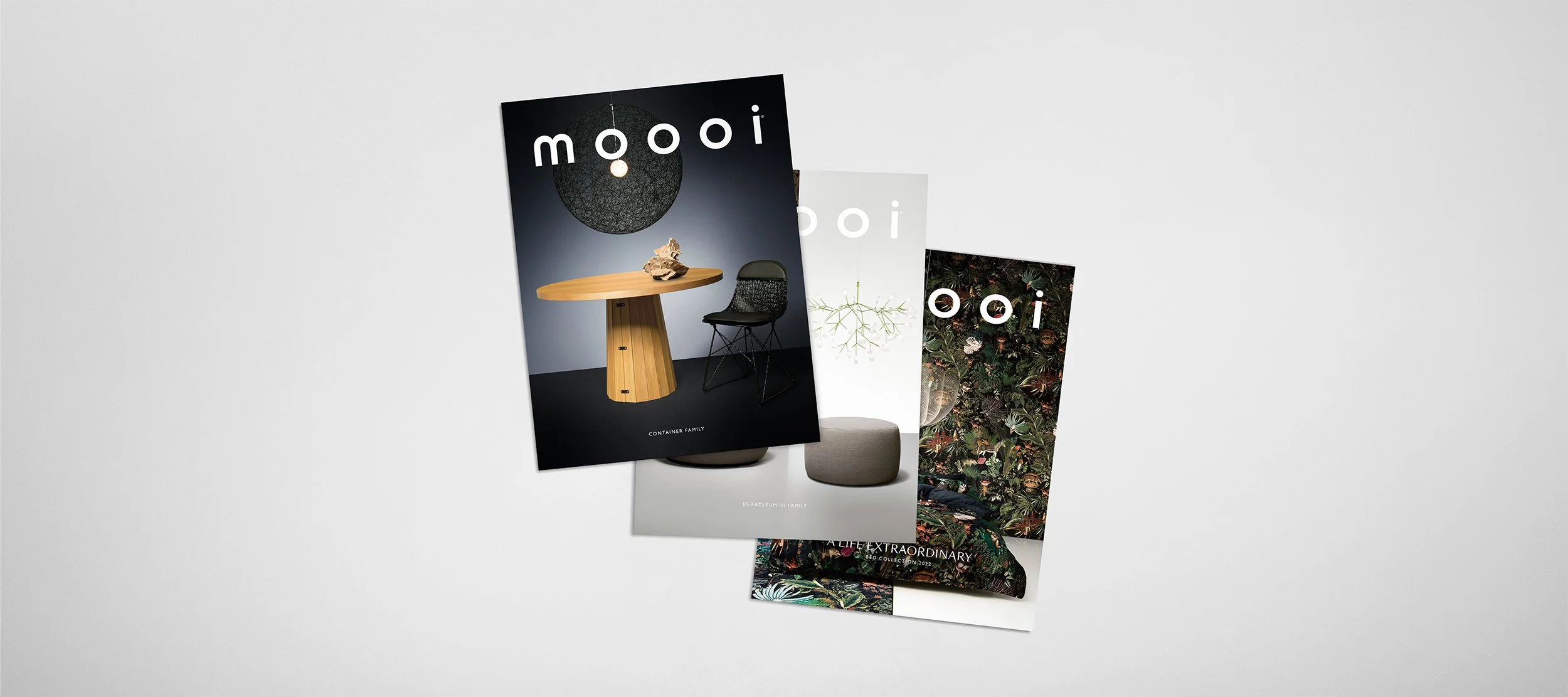 Three overlapping interior design catalogs, Moooi book, editorial project by Automne Studio.