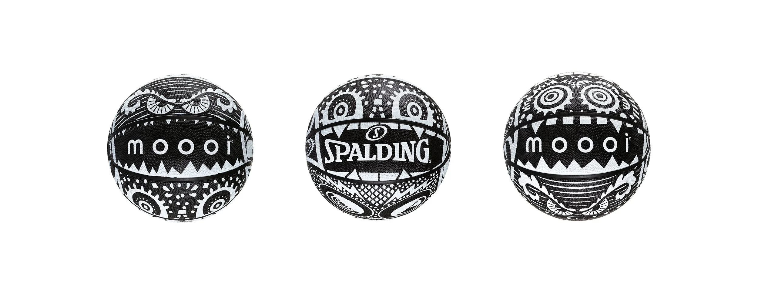 Three black-and-white Moooi x Spalding basketballs, with the Marcel Wanders’ iconic Monster graphics, illustration project by Automne Studio.