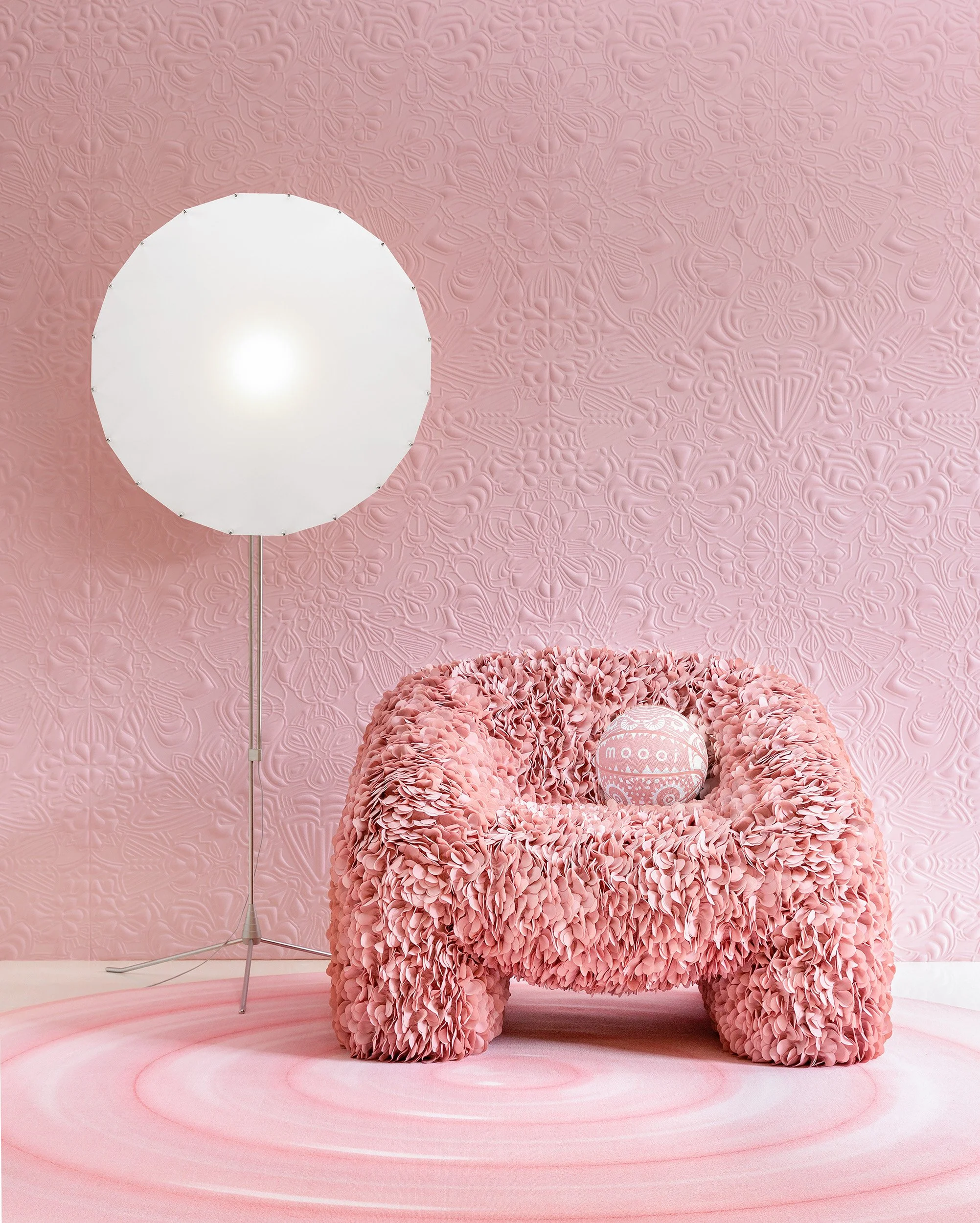 Pink Moooi x Spalding basketball on a pink Hortensia armchair, with the Marcel Wanders’ iconic Monster graphics, illustration project by Automne Studio.