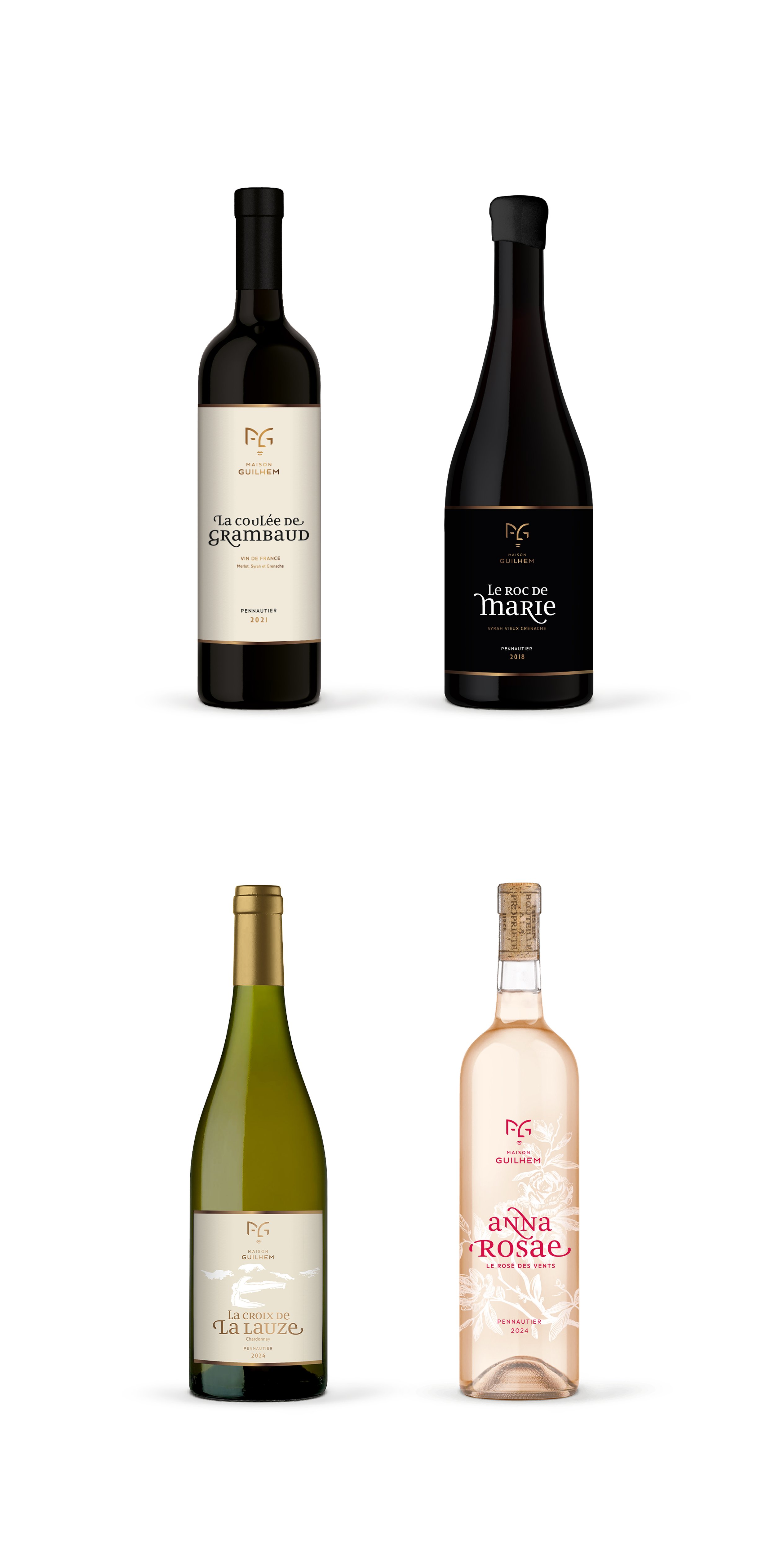 Four Maison Guilhem wine bottles: Le Roc de Marie premium red wine, La Coulée de Grambaud red wine, La Croix de la Lauze Chardonnay, Anna Rosae rosé wine, Maison Guilhem, French vineyard, branding and editorial project by Automne Studio.