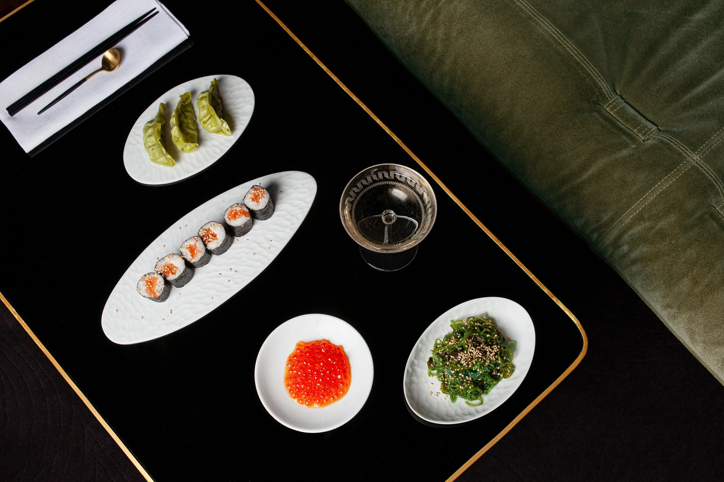 Top-down view of Japanese sushi meal, Ovum collection, Sarah-Linda, sensual tableware, branding, web design and editorial project by Automne Studio.