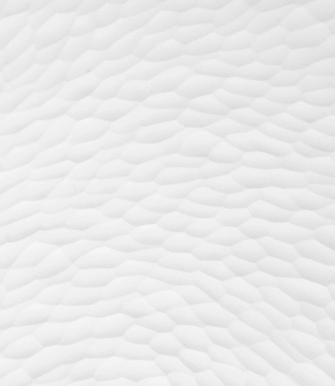 Close-up of a white textured Indulge plate surface with soft, irregular ridges, Sarah-Linda, sensual tableware, branding, web design and editorial project by Automne Studio.