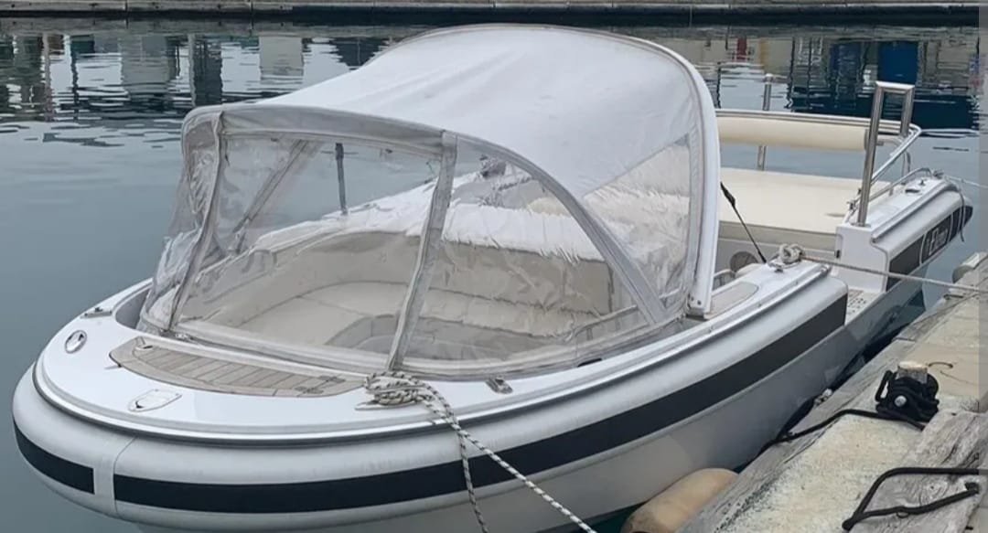 2014 Novurania Chase 19 luxury yacht tender with Volvo 220HP engine, white hull, and sleek seating – ideal for VIP transfers or day cruising