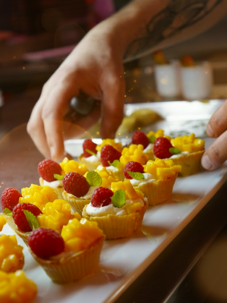 Gourmet chef preparing small bites for a private catering event
