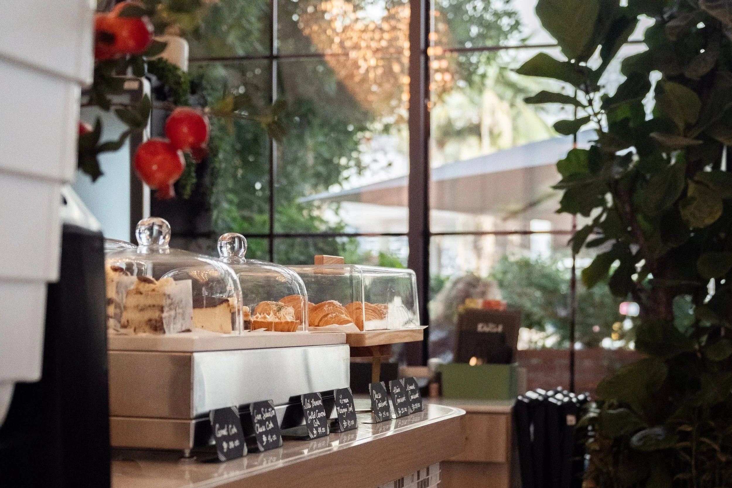 Pâtisserie at The Red Door serving homemade carrot cake, lemon meringue tart, chocolate hazelnut brownie and freshly baked croissants