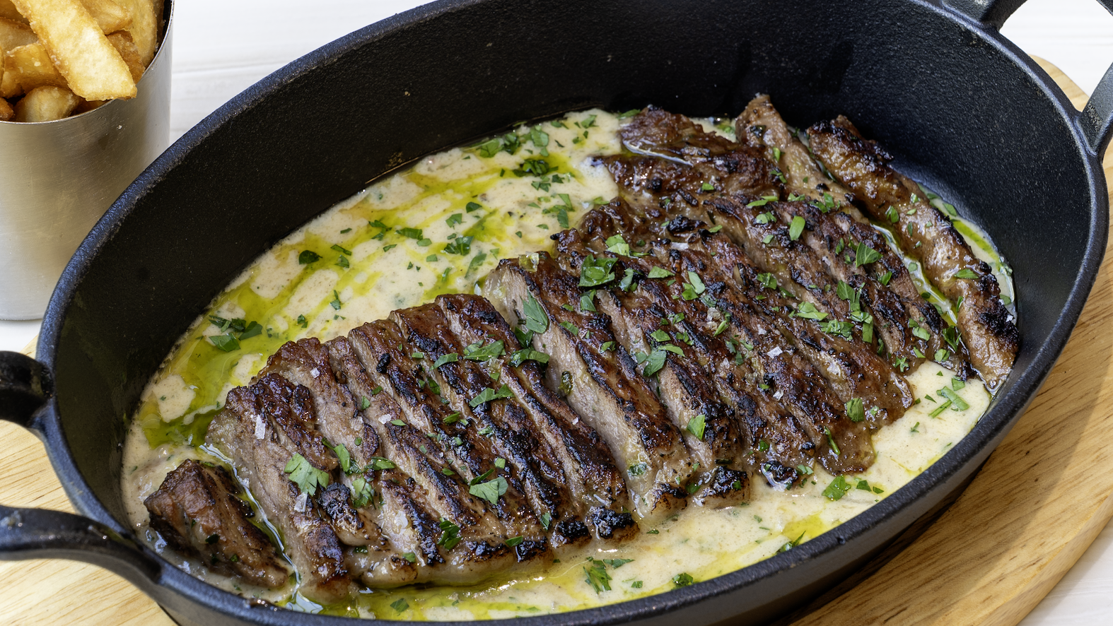 Best-Selling Steak Frites served for lunch & dinner at The Red Door
