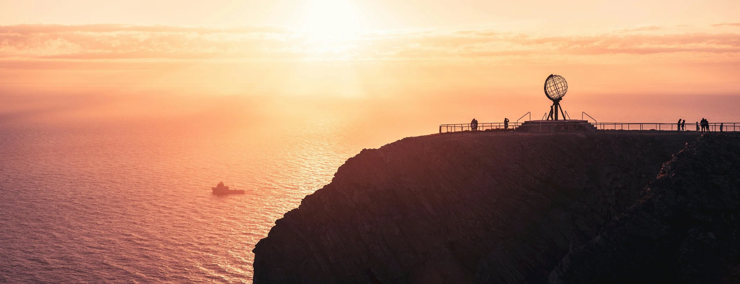 Golden sunset at North Cape. Midnight sun Norway, Arctic landscape photography, Norway sunset