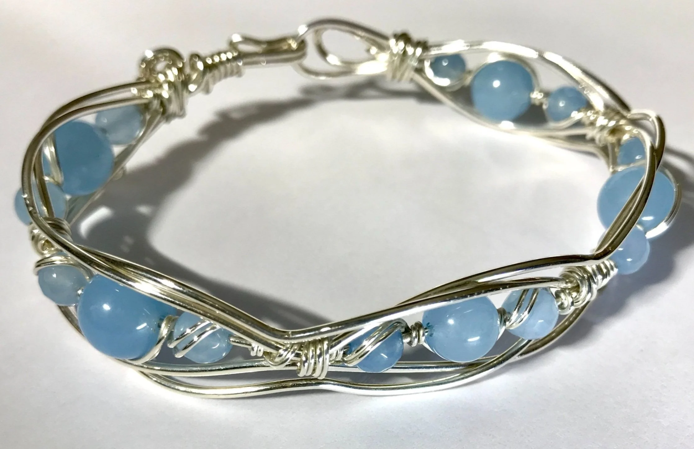 Elizabeth Veglia Artist Jewelry Maker Mosaic Artist Silver wire bracelet with light blue beads