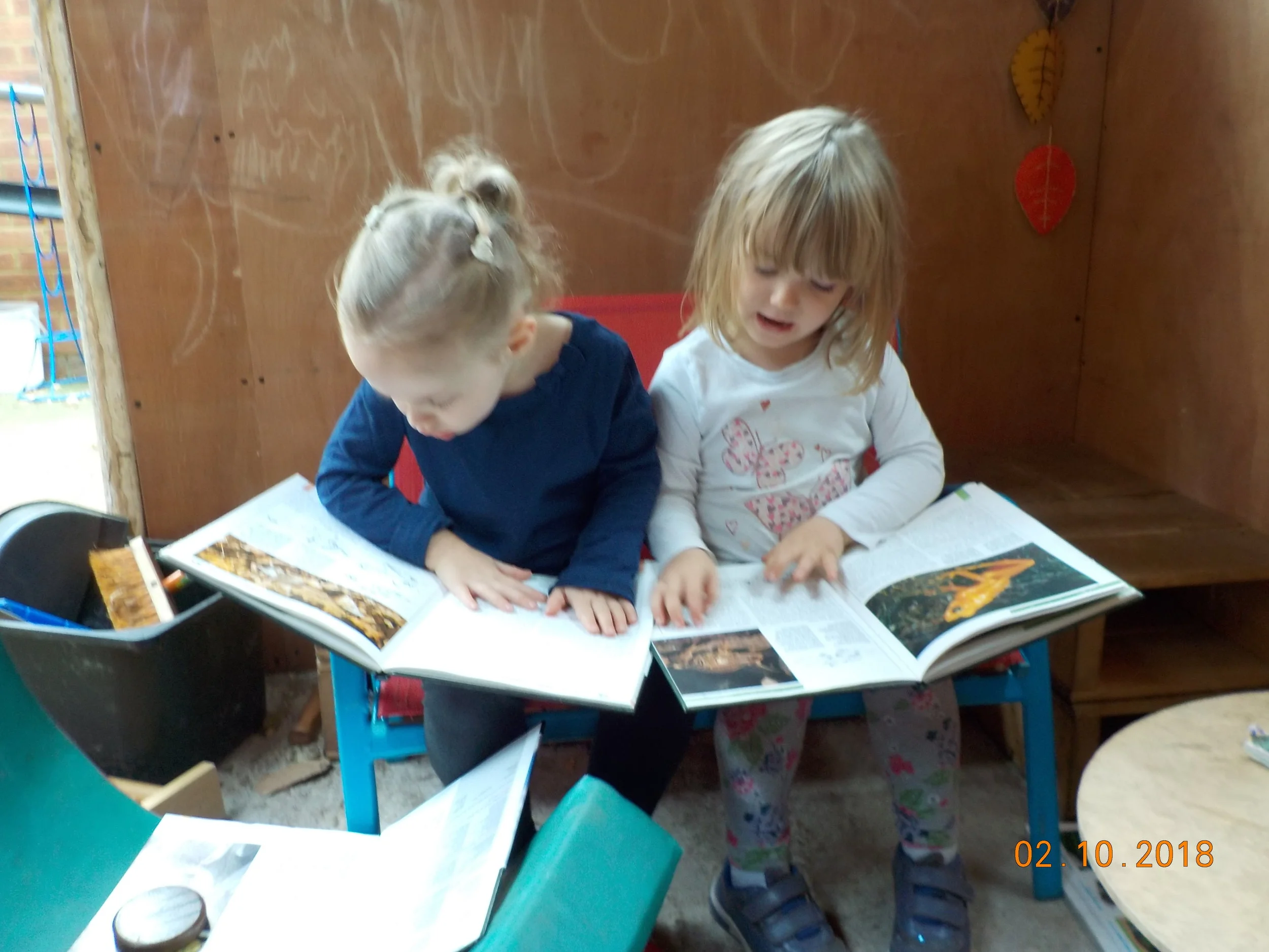 Reading in our lovely outdoor shelter