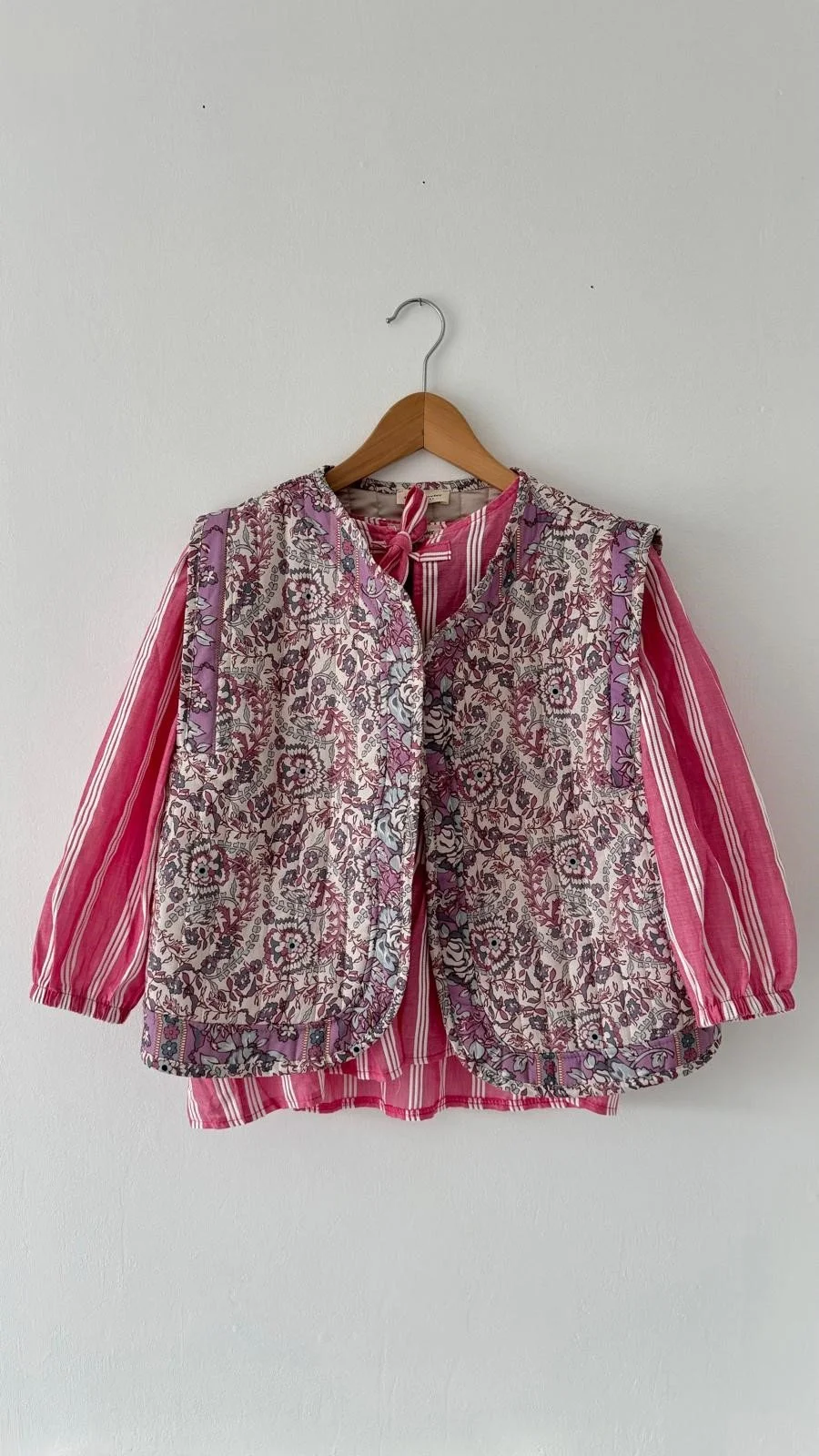 pink striped shirt with overcoat