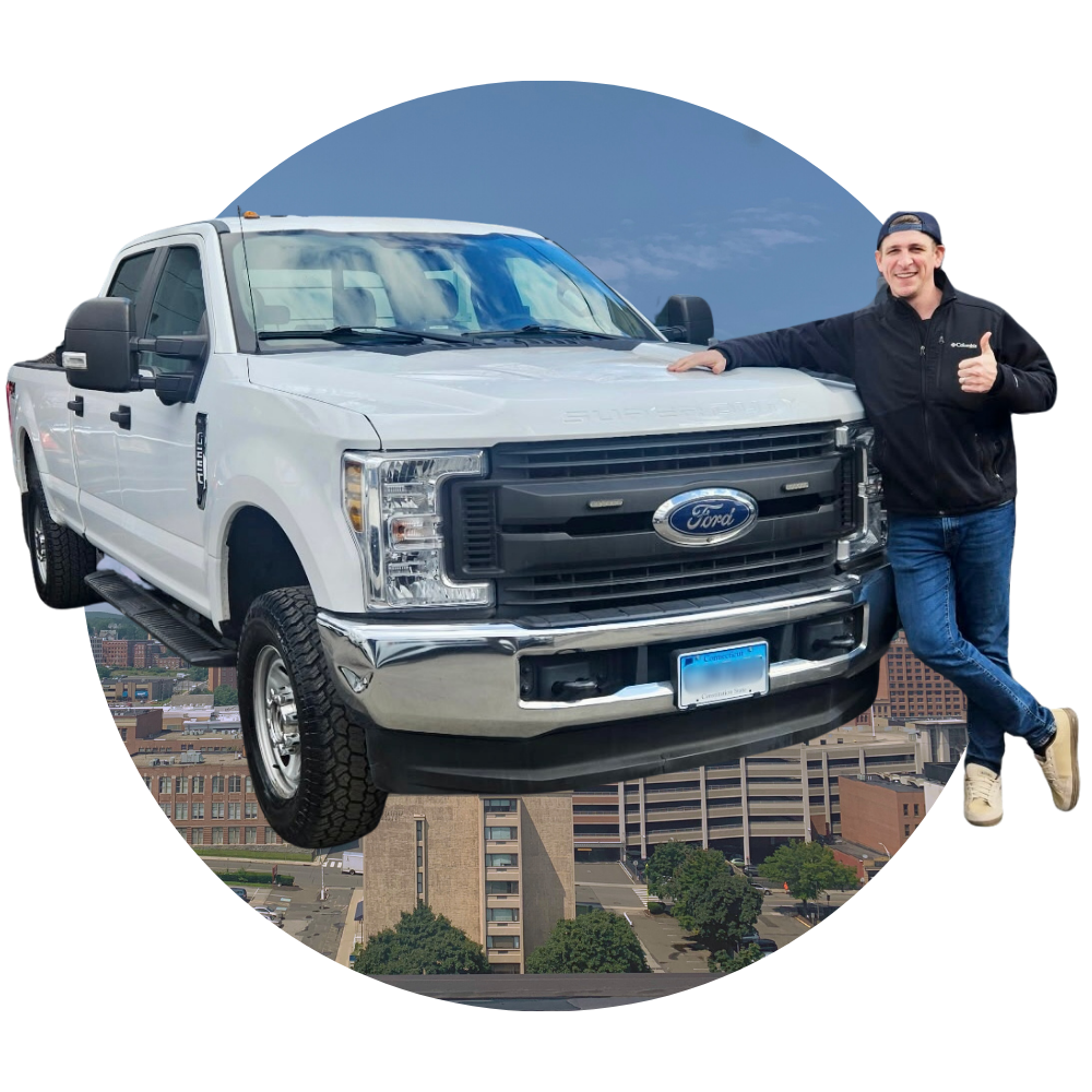 Look at our glorious MOVE IT OR LOSE IT man next to his trusty pickup truck located in the Greater Waterbury Region.