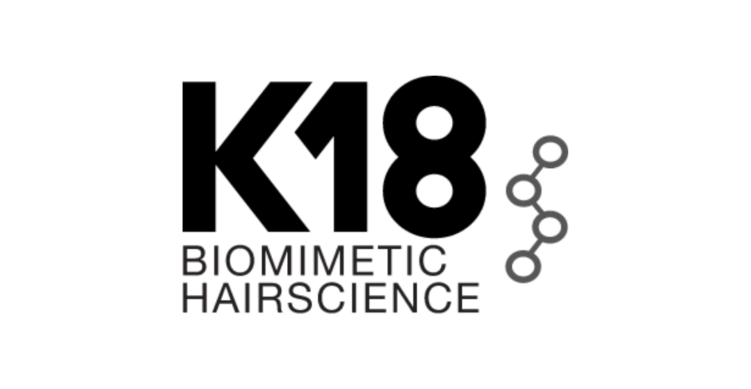 Logo for K18 Biometrical Hair Science, featuring bold black text 'K18' and smaller text 'Biometric Hair Science', with a molecular diagram on the right side.