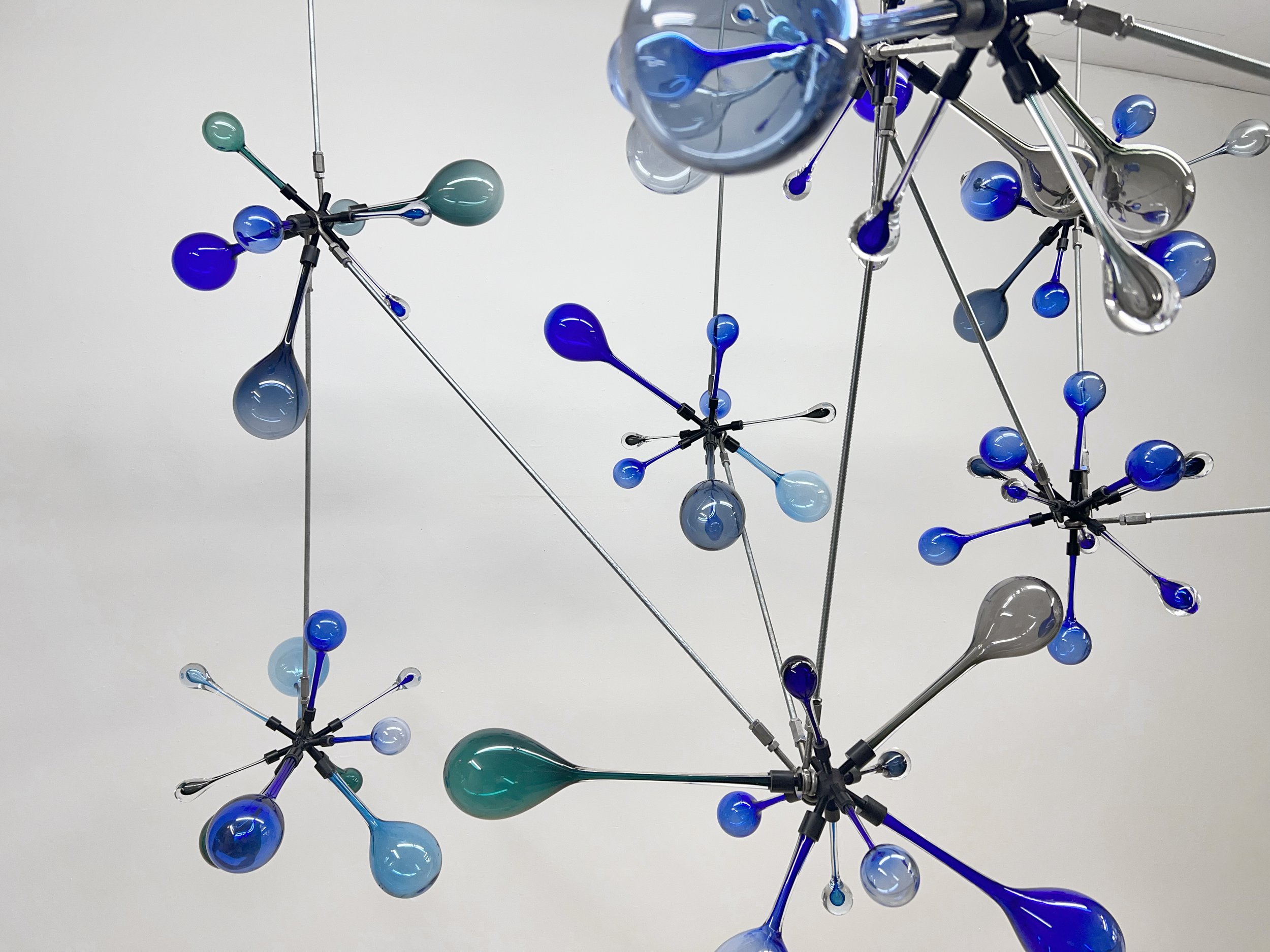 Untitled (Blue Ejecta) | Blown glass, steel, epoxy, and hardware | Dimensions variable