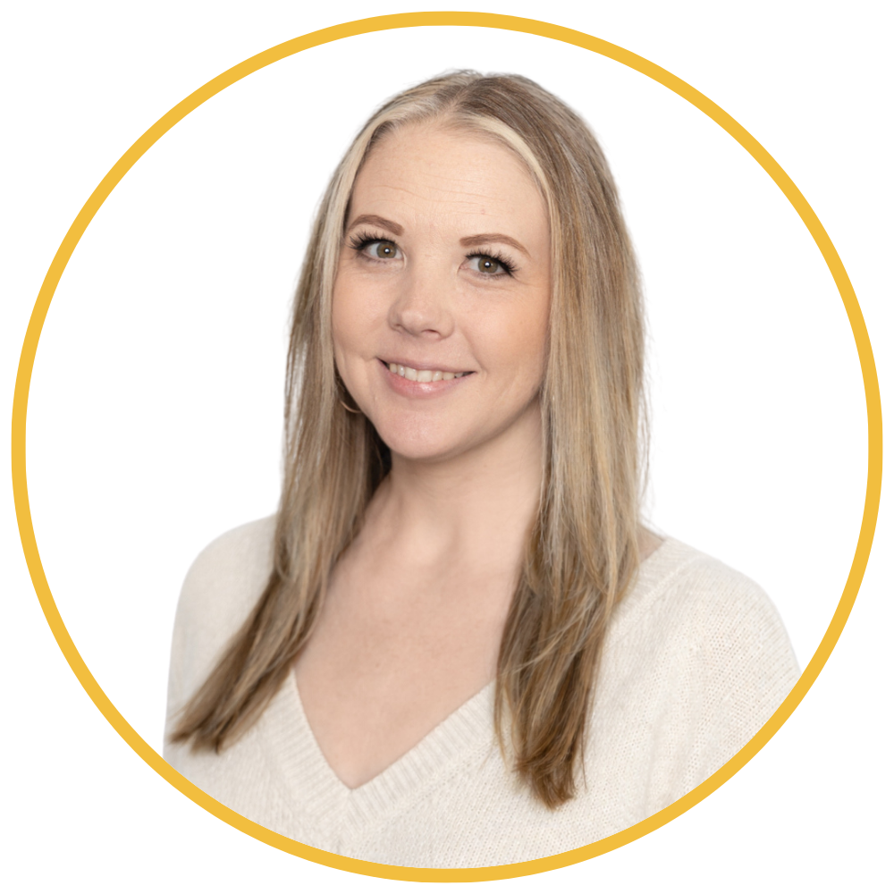 A woman with straight blonde hair smiling at the camera, wearing a light-colored sweater, against a white background with a gold circular border.