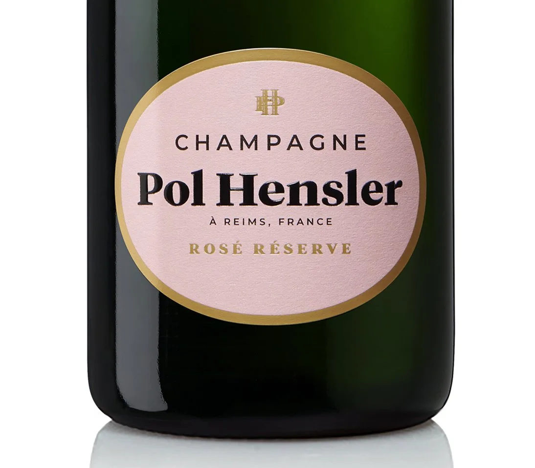 Étiquette de bouteille de champagne Pol Hensler Rosé Réserve, produit à Reims, France.