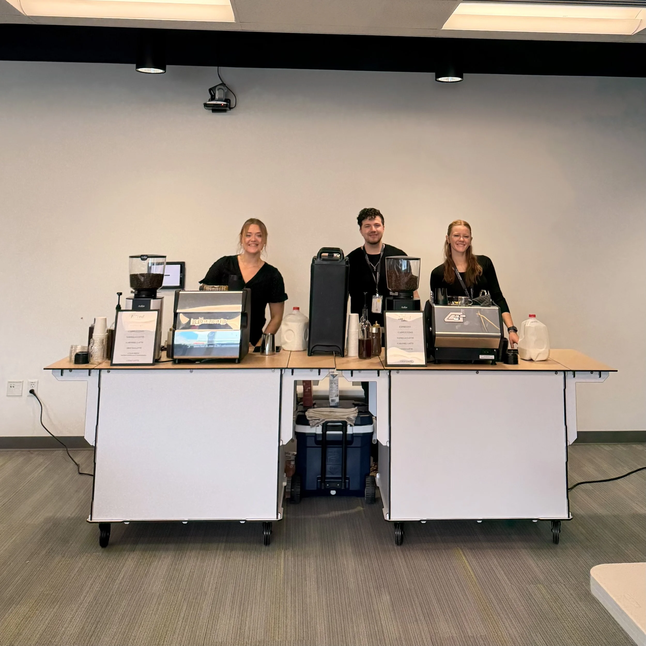 Lifted Coffee Cart team with two mobile espresso bar carts set up for a large corporate event in Boise Idaho