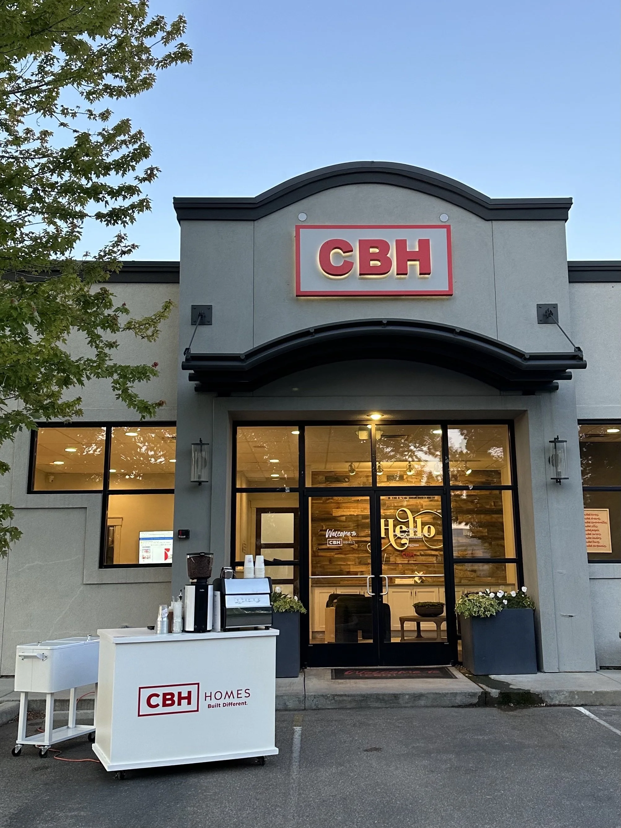 Exterior view of a CBH HOMES building with our mobile coffee catering cart serving espresso and specialty coffee in Boise Idaho and the treasure valley.