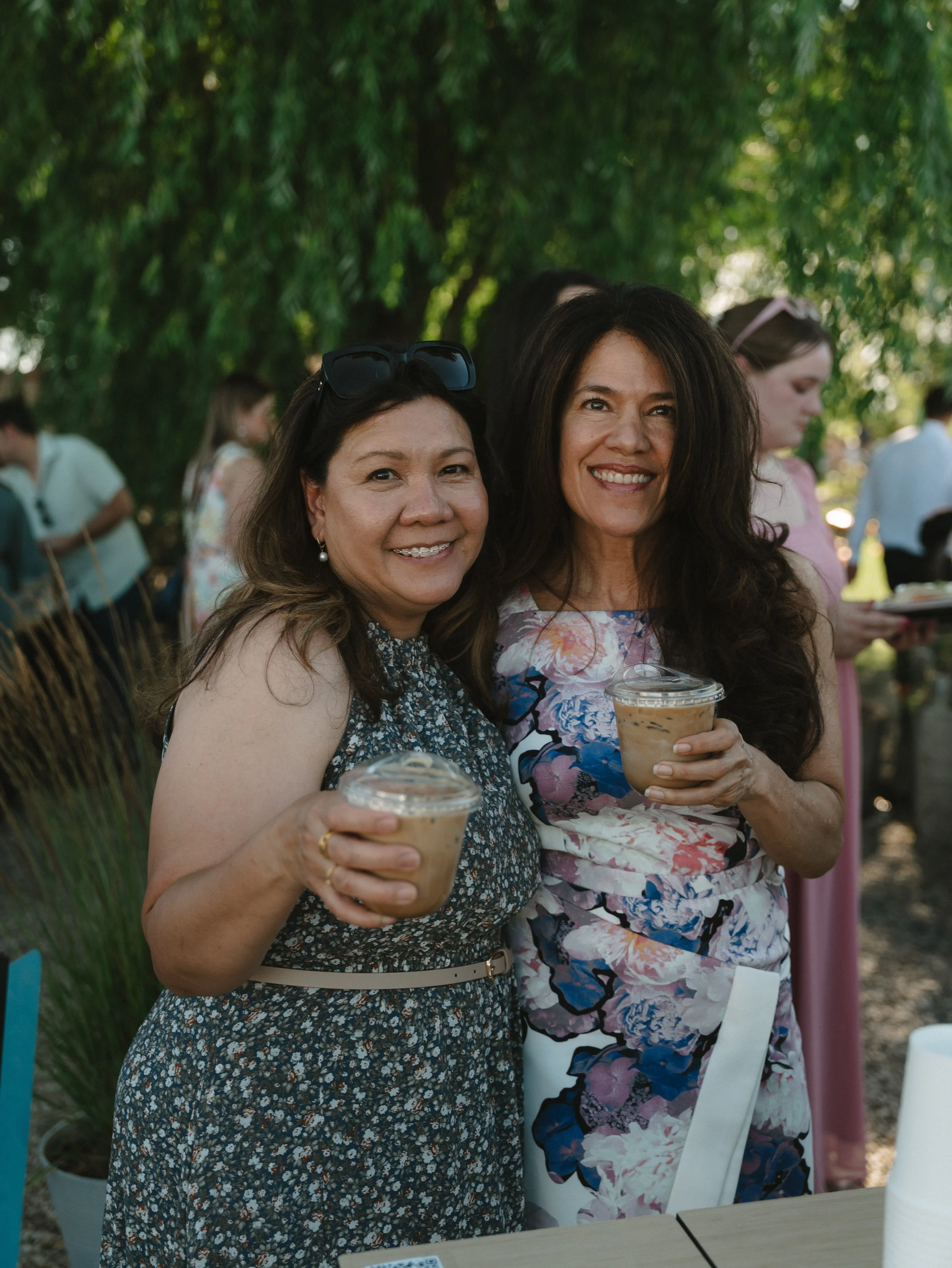 Wedding guests enjoying handcrafted lattes from a mobile coffee cart in Boise, Idaho.