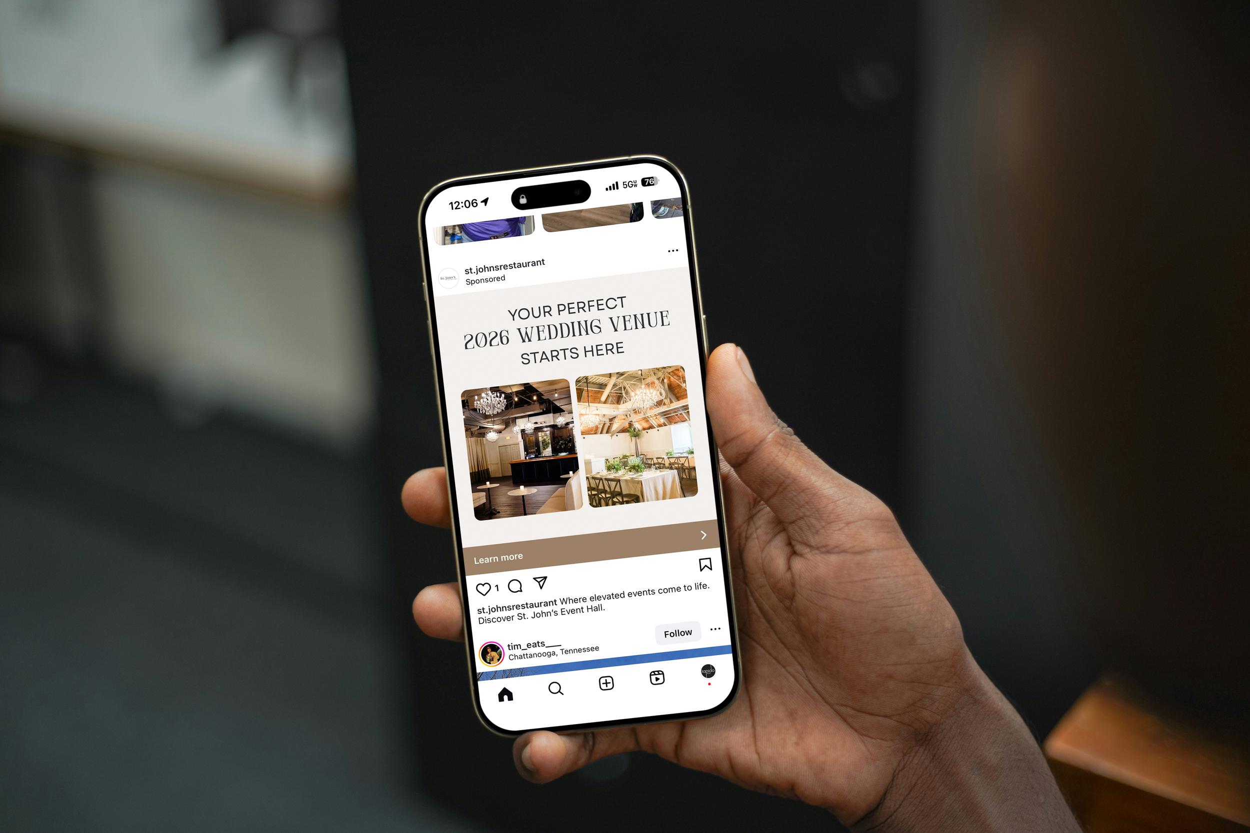 Person holding a smartphone displaying an Instagram ad for a wedding venue with images of decorated interiors.