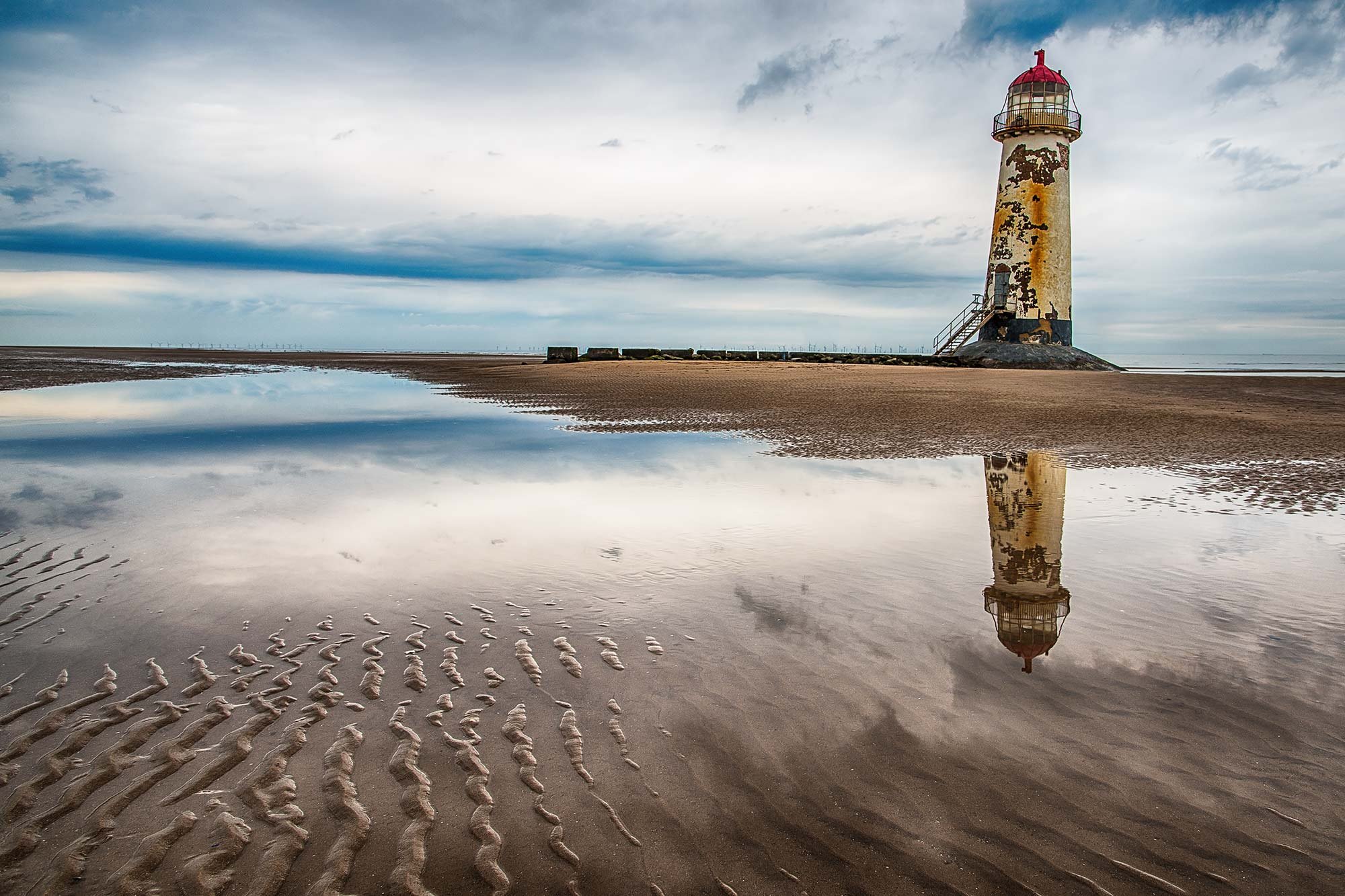 Point of Ayr lighthouse on Talacre beach on a winter evening