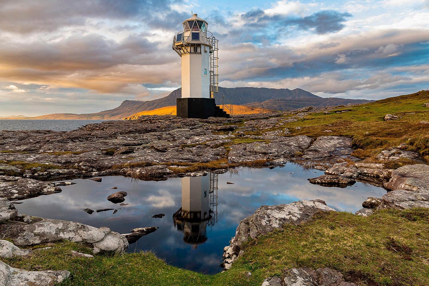 Rhue lighthouse at sunset near Ullapool