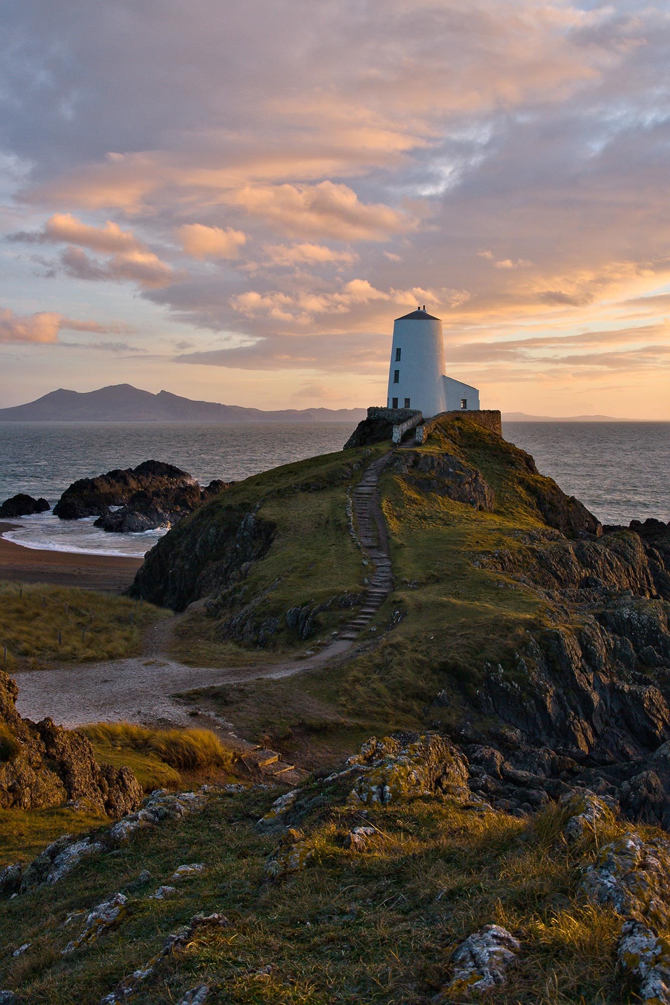 Twr Mawr lighthouse at sunset on Llanddwyn Island Anglesey