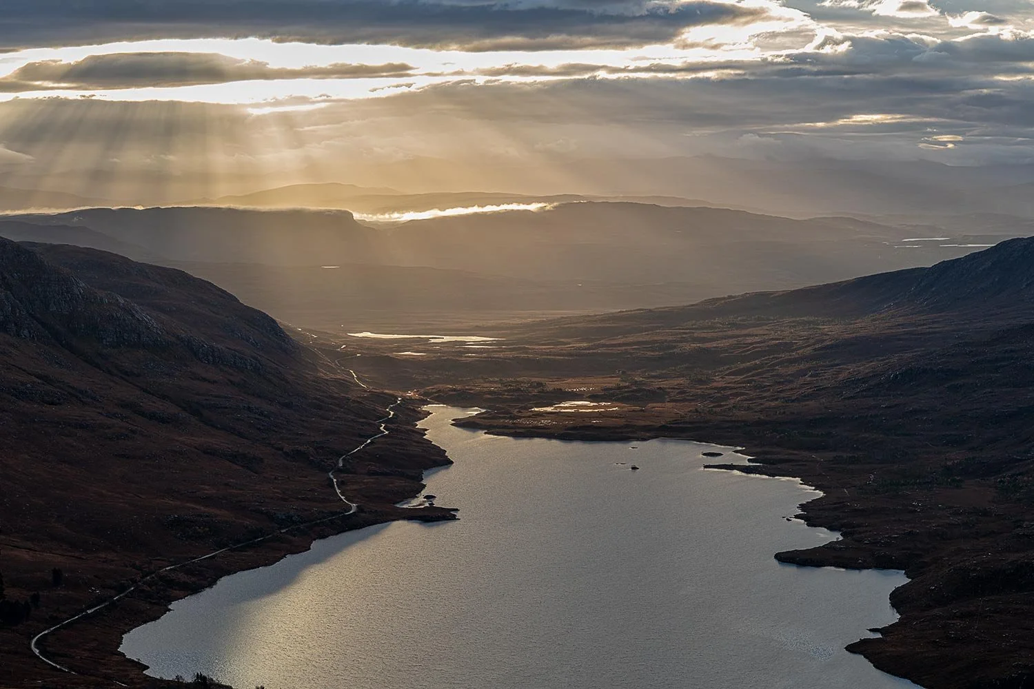 A Stac Pollaidh walk to photograph the sunrise over Coigach Scotland.