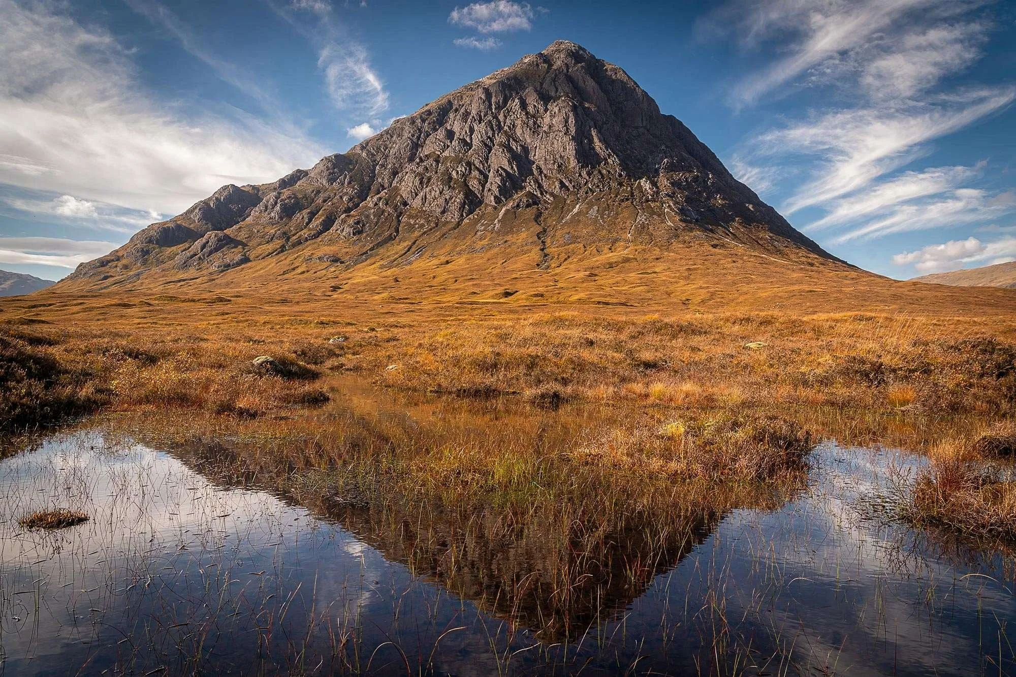 Beautiful autumn reflection of Buachaille Etive Mor in Glencoe