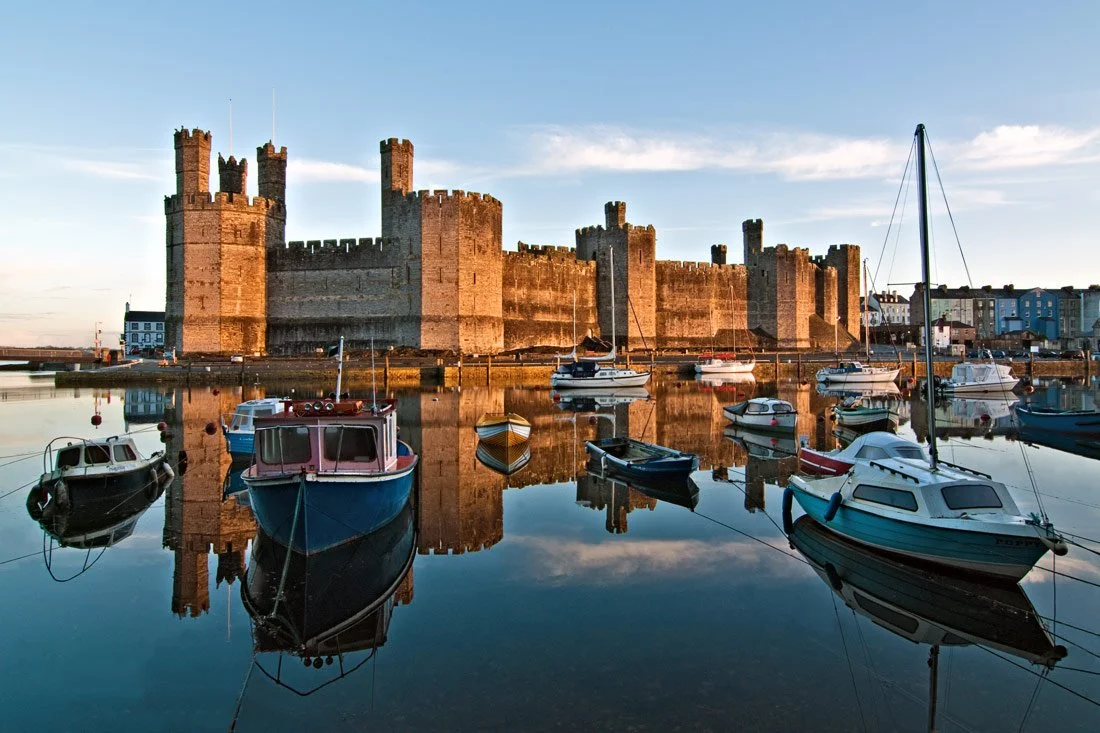 Caernarfon castle reflections in the Afon Seoint 