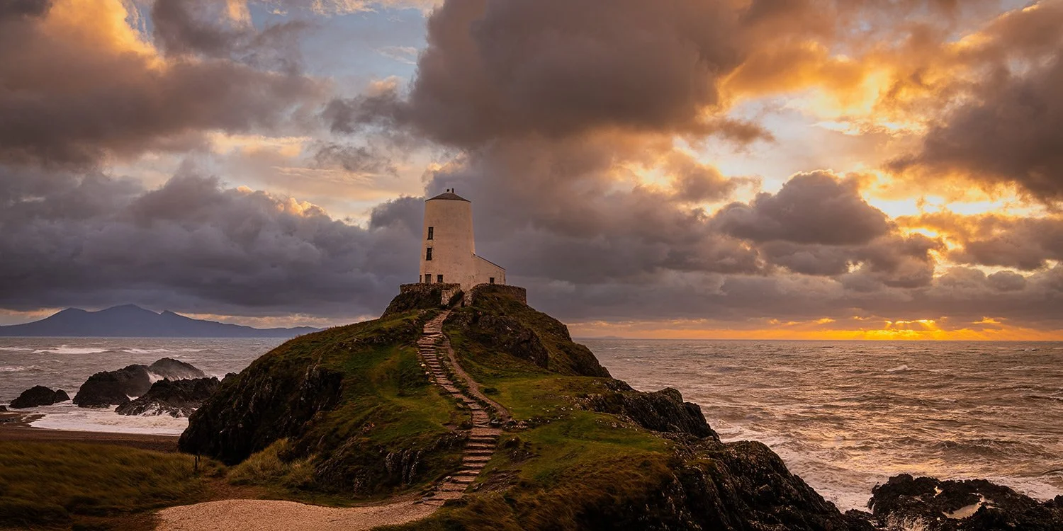 Stunning stormy winter sunset on Llanddwyn Island