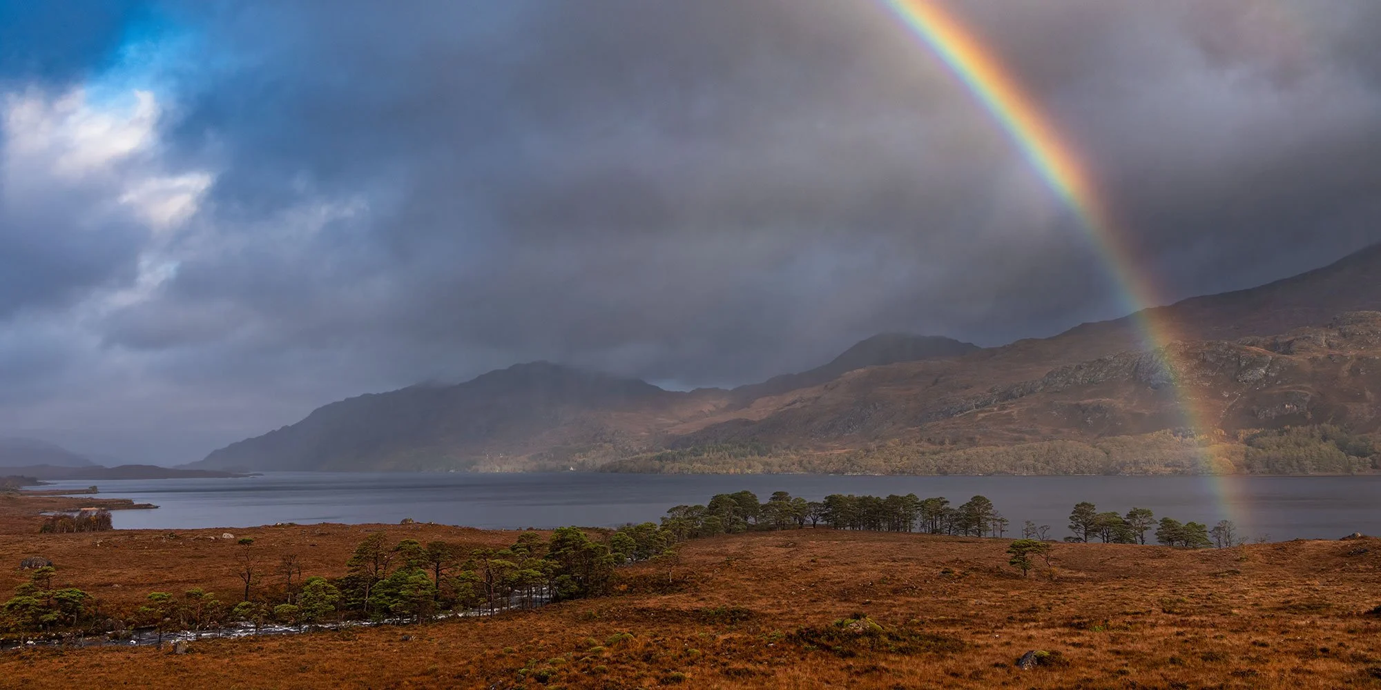 Loch Maree rainbow in Beinn Eighe National Nature Reserve.